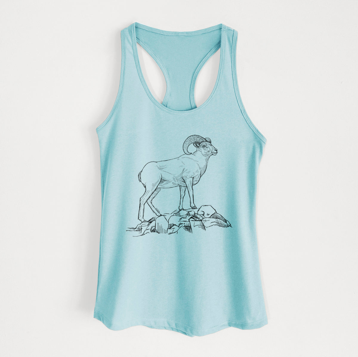 Cancun blue women's racerback tank top laid flat, printed with a black ink illustration of a bighorn ram with curled horns standing on rocks.