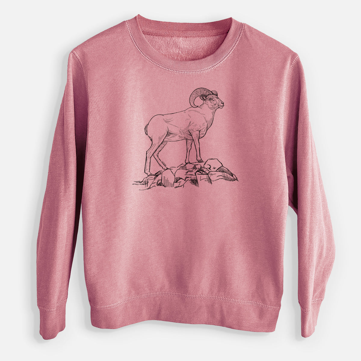 Mauve pink youth crewneck sweatshirt laid flat, printed with a black ink illustration of a bighorn ram with curled horns standing on rocks.