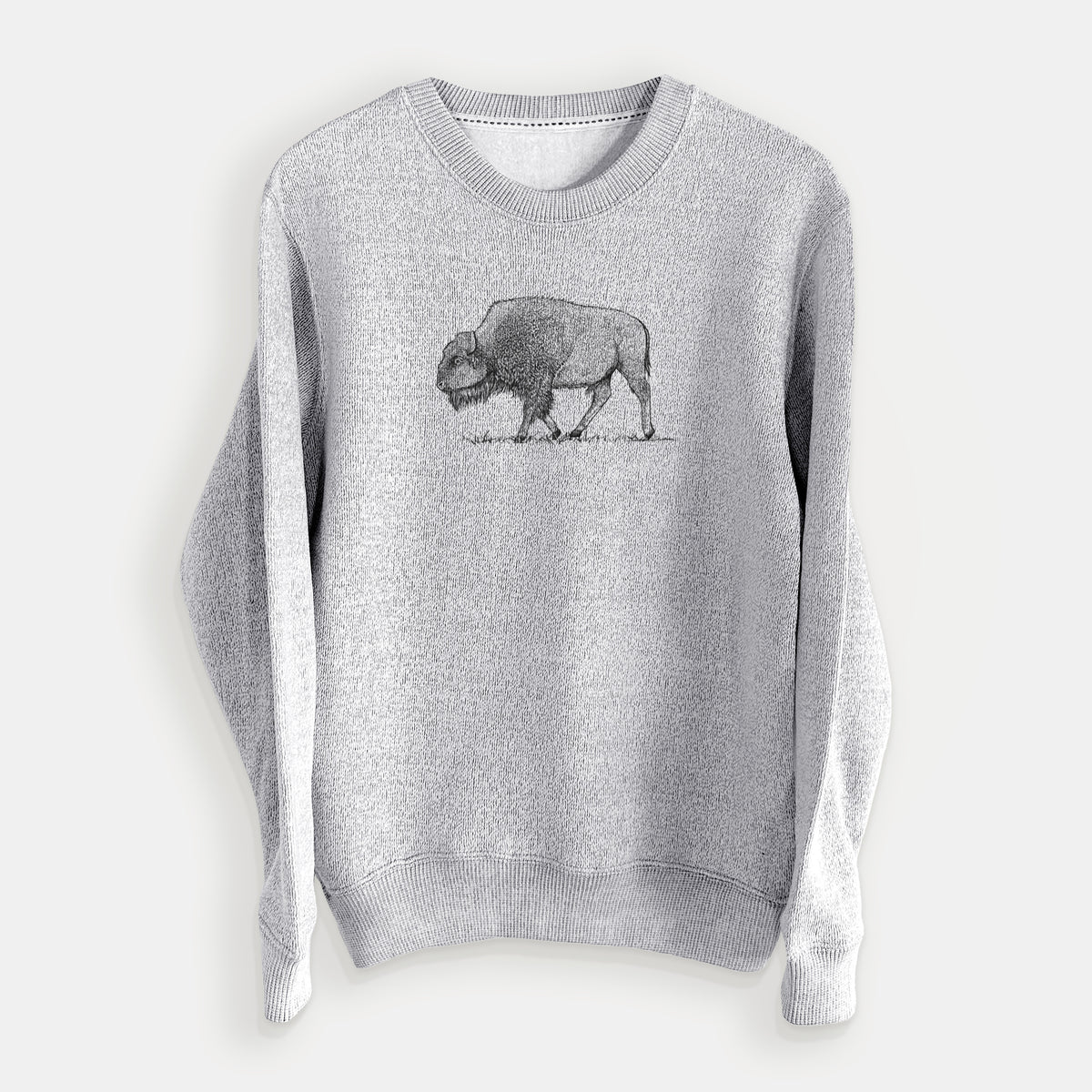 Salt and pepper knit sweatshirt laid flat, printed with a detailed black ink illustration of an American bison walking through grass.