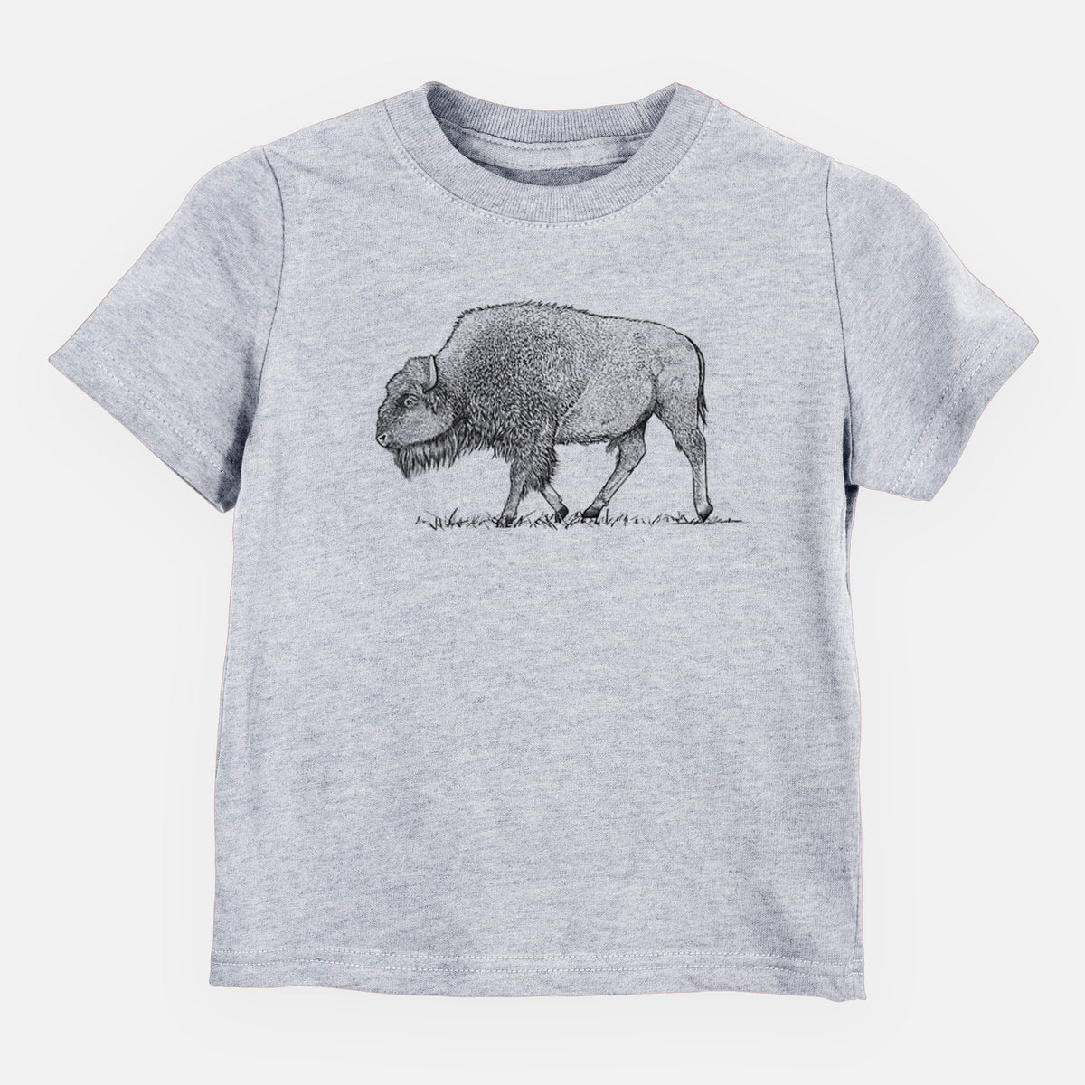 Heather grey toddler t-shirt laid flat, printed with a detailed black ink illustration of an American bison walking through grass.