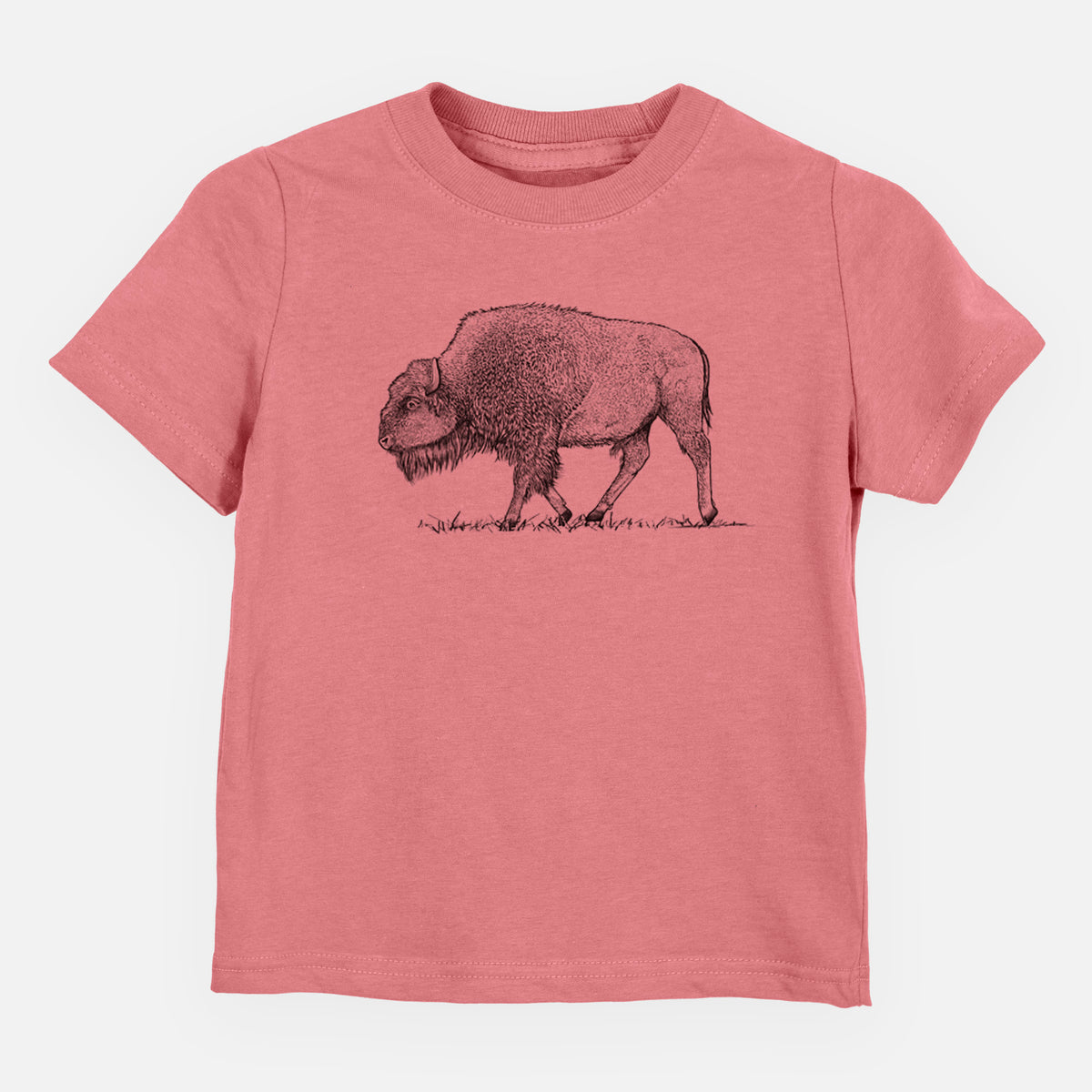 Mauve pink toddler t-shirt laid flat, printed with a detailed black ink illustration of an American bison walking through grass.