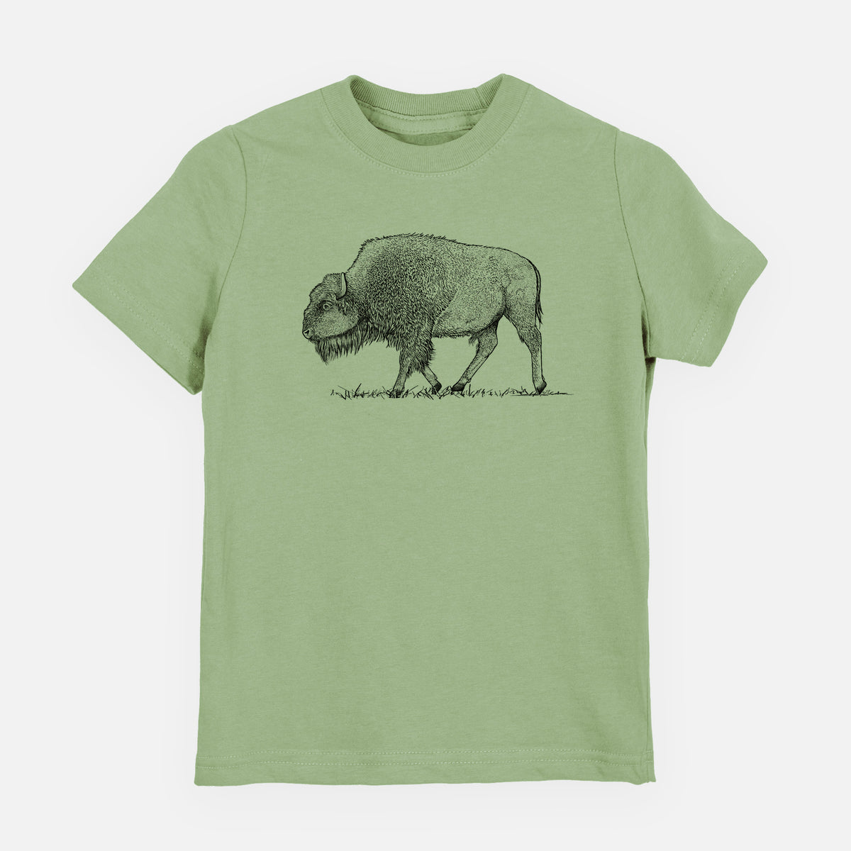 Sage green youth t-shirt laid flat, printed with a detailed black ink illustration of an American bison walking through grass.