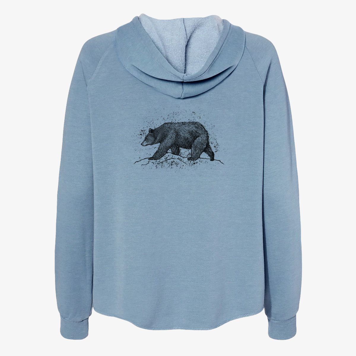 Misty blue women's Cali Wave zip-up sweatshirt laid flat, printed with a detailed black ink sketch of a black bear walking across rocky ground.