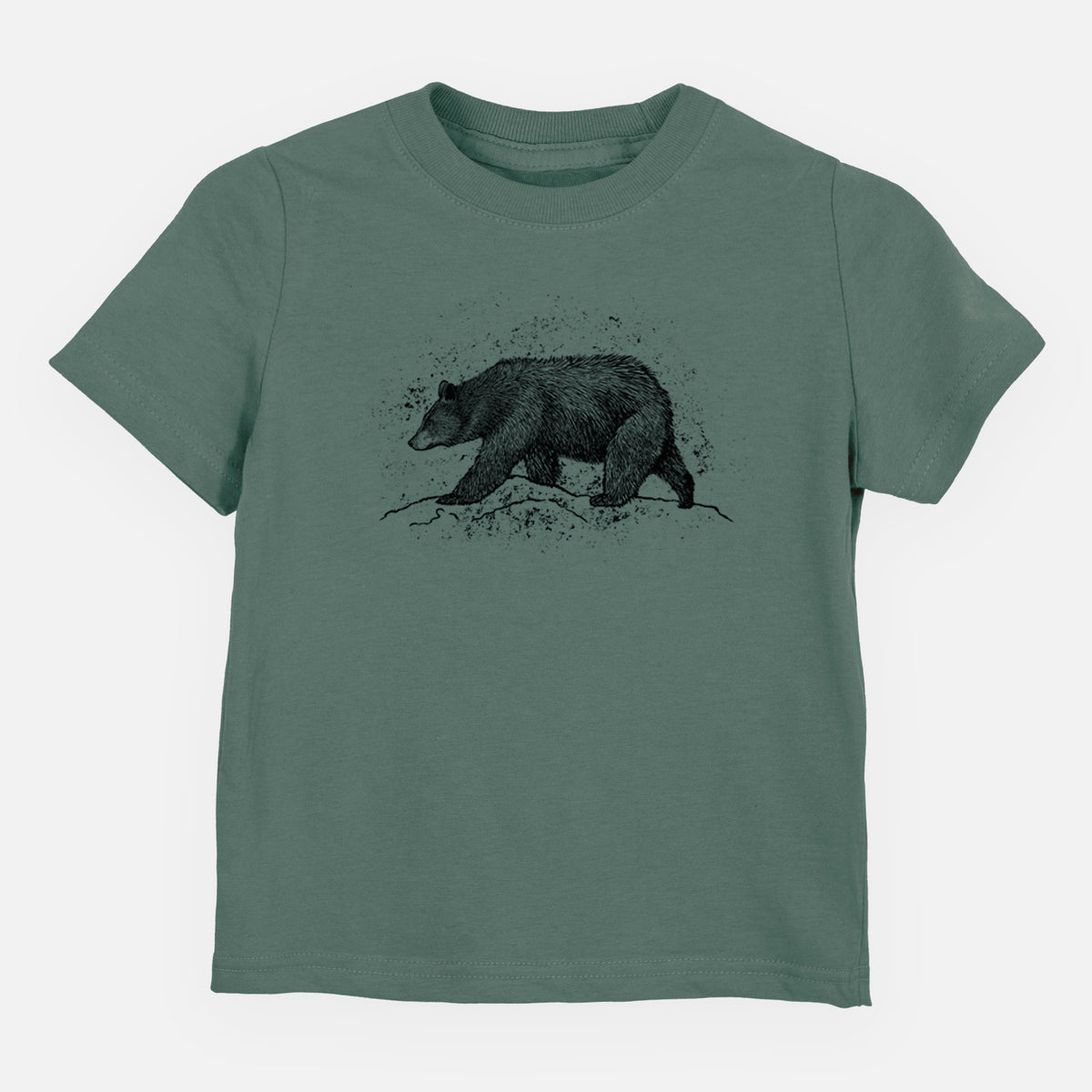 Basil green toddler t-shirt laid flat, printed with a detailed black ink sketch of a black bear walking across rocky ground.