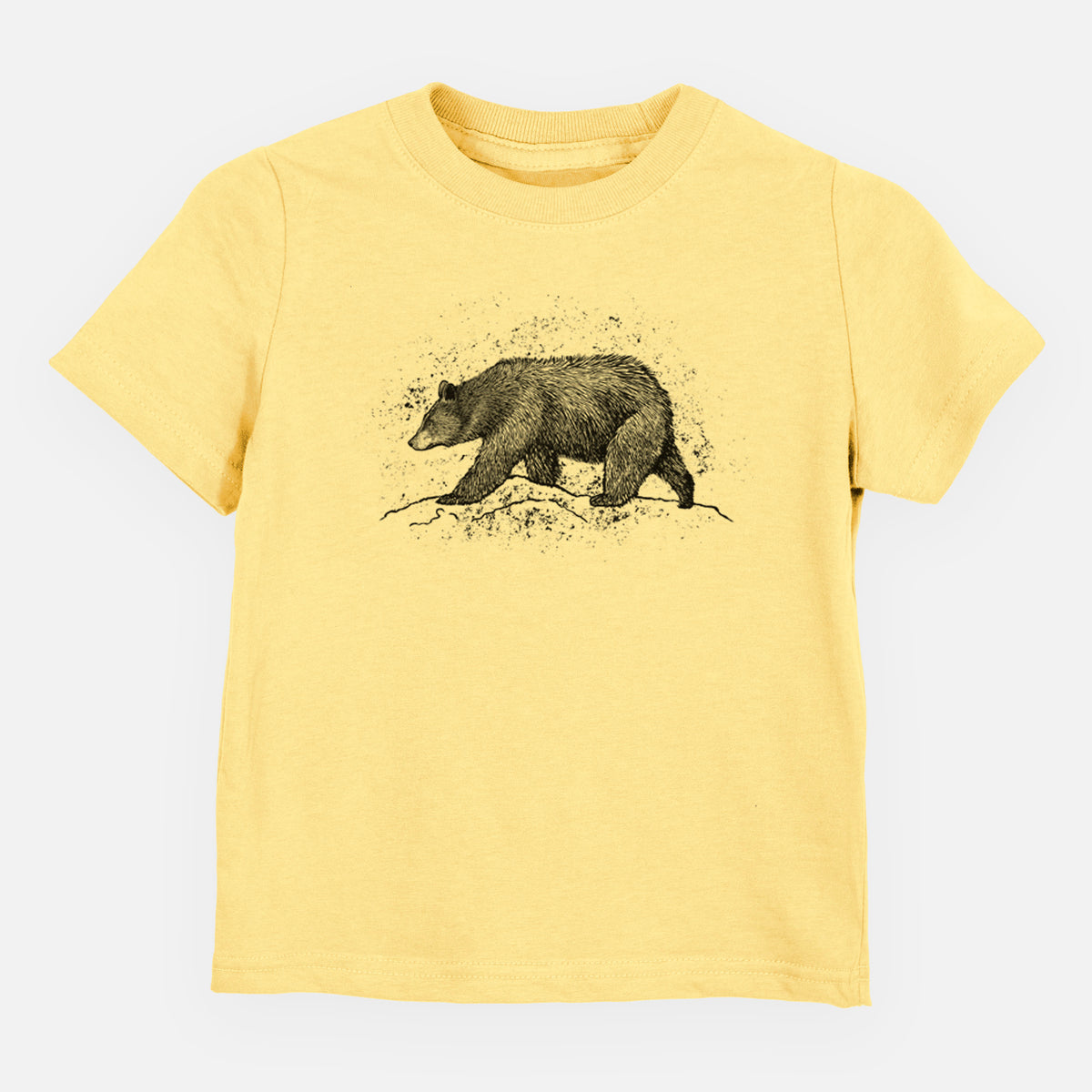 Butter yellow toddler t-shirt laid flat, printed with a detailed black ink sketch of a black bear walking across rocky ground.