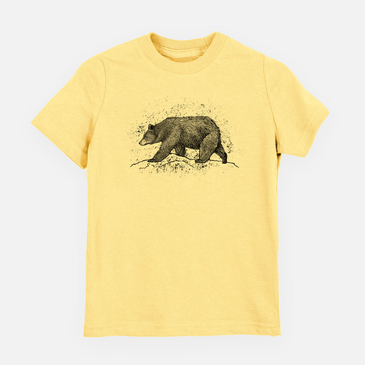 Butter yellow youth t-shirt laid flat, printed with a detailed black ink sketch of a black bear walking across rocky ground.