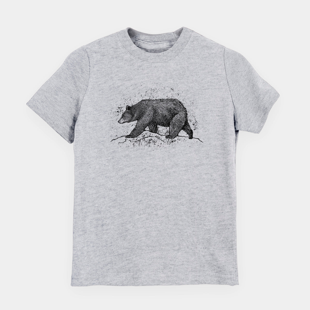 Heather grey youth t-shirt laid flat, printed with a detailed black ink sketch of a black bear walking across rocky ground.