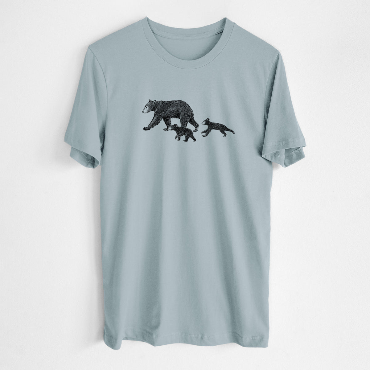 Vintage denim lightweight cotton t-shirt laid flat, printed with a black ink illustration of a mother black bear walking with two cubs.