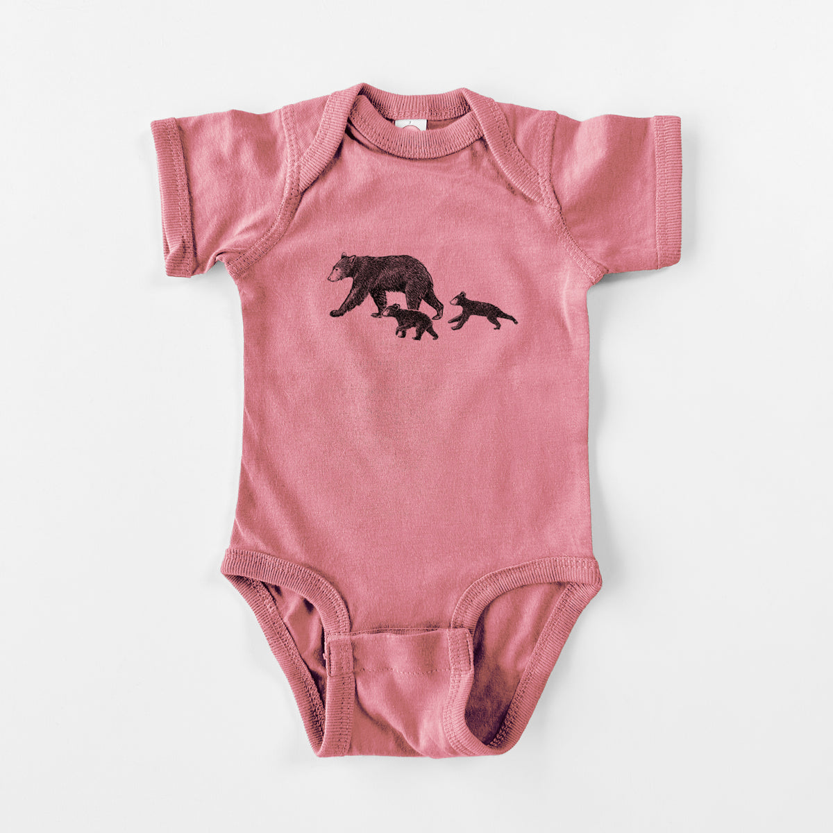 Mauve pink baby bodysuit laid flat, printed with a black ink illustration of a mother black bear walking with two cubs.