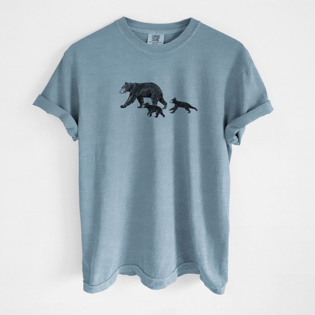 Steel blue Comfort Colors t-shirt laid flat, printed with a black ink illustration of a mother black bear walking with two cubs.
