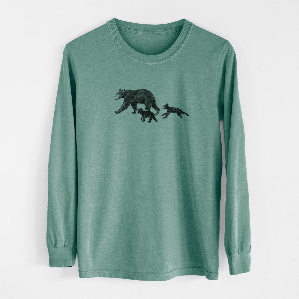 Pine green Comfort Colors long sleeve shirt laid flat, printed with a black ink illustration of a mother black bear walking with two cubs.
