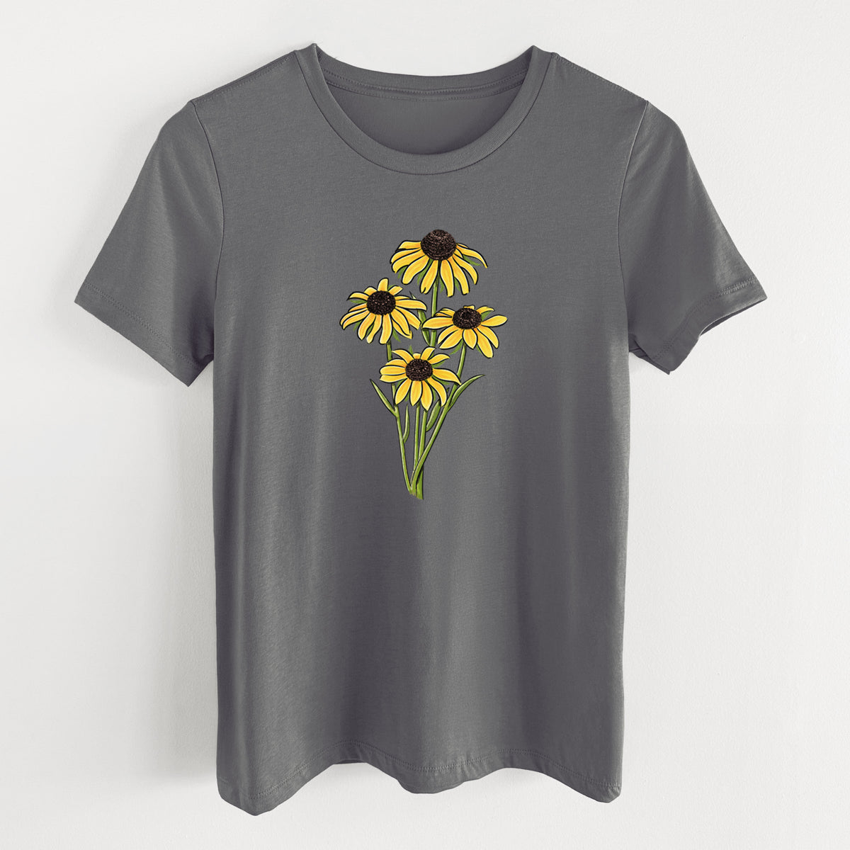 Asphalt women's relaxed fit cotton t-shirt laid flat, printed with a full-color bouquet of yellow black-eyed Susan flowers.