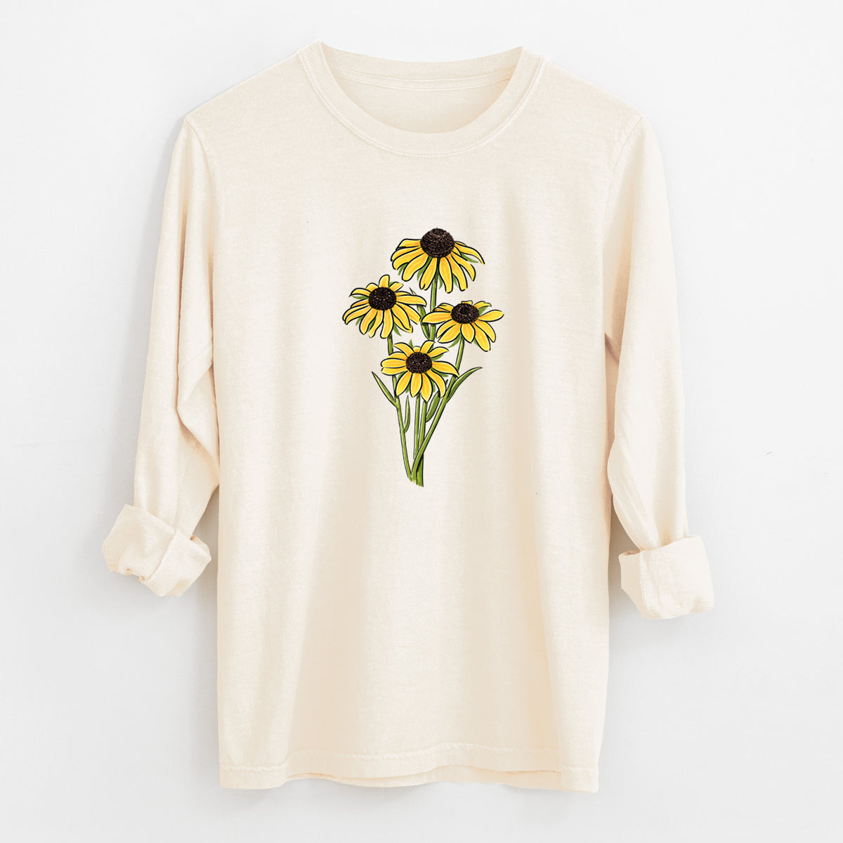 Ivory Comfort Colors long sleeve shirt laid flat with the cuffs rolled, printed with a full-color bouquet of yellow black-eyed Susan flowers.