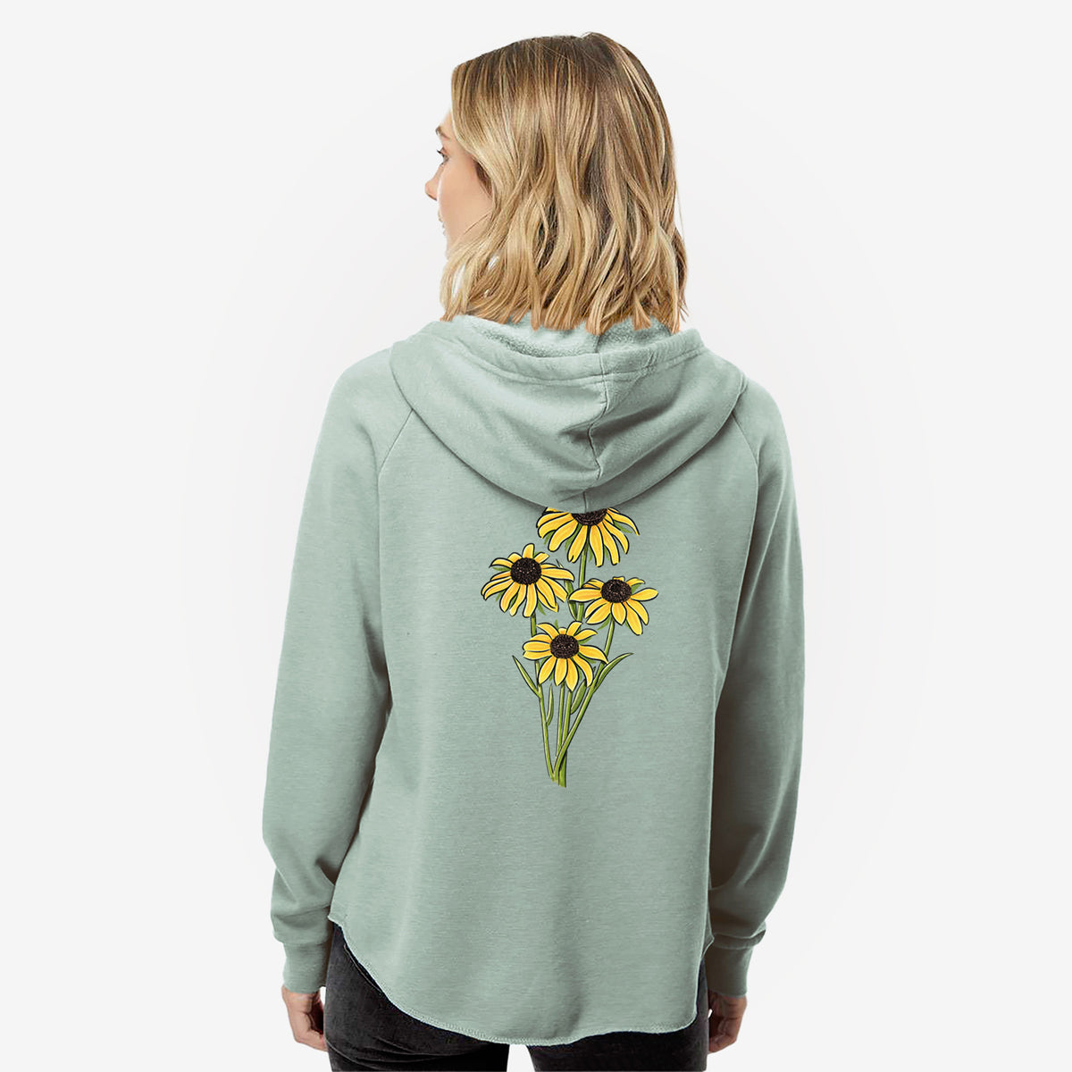 Woman wearing a sage green women's Cali Wave zip-up sweatshirt printed with a full-color bouquet of yellow black-eyed Susan flowers, seen from behind.