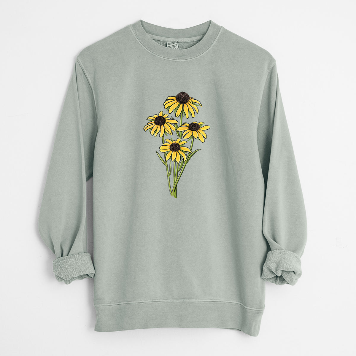 Sage green pigment dyed crewneck sweatshirt laid flat with the sleeves rolled, printed with a full-color bouquet of yellow black-eyed Susan flowers.