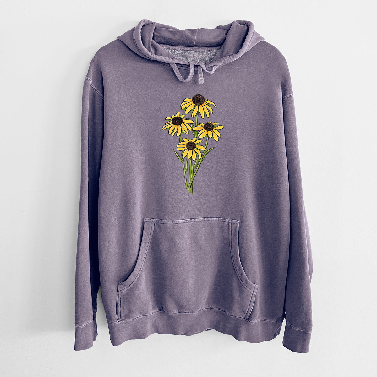 Plum purple pigment dyed hoodie laid flat, printed with a full-color bouquet of yellow black-eyed Susan flowers.