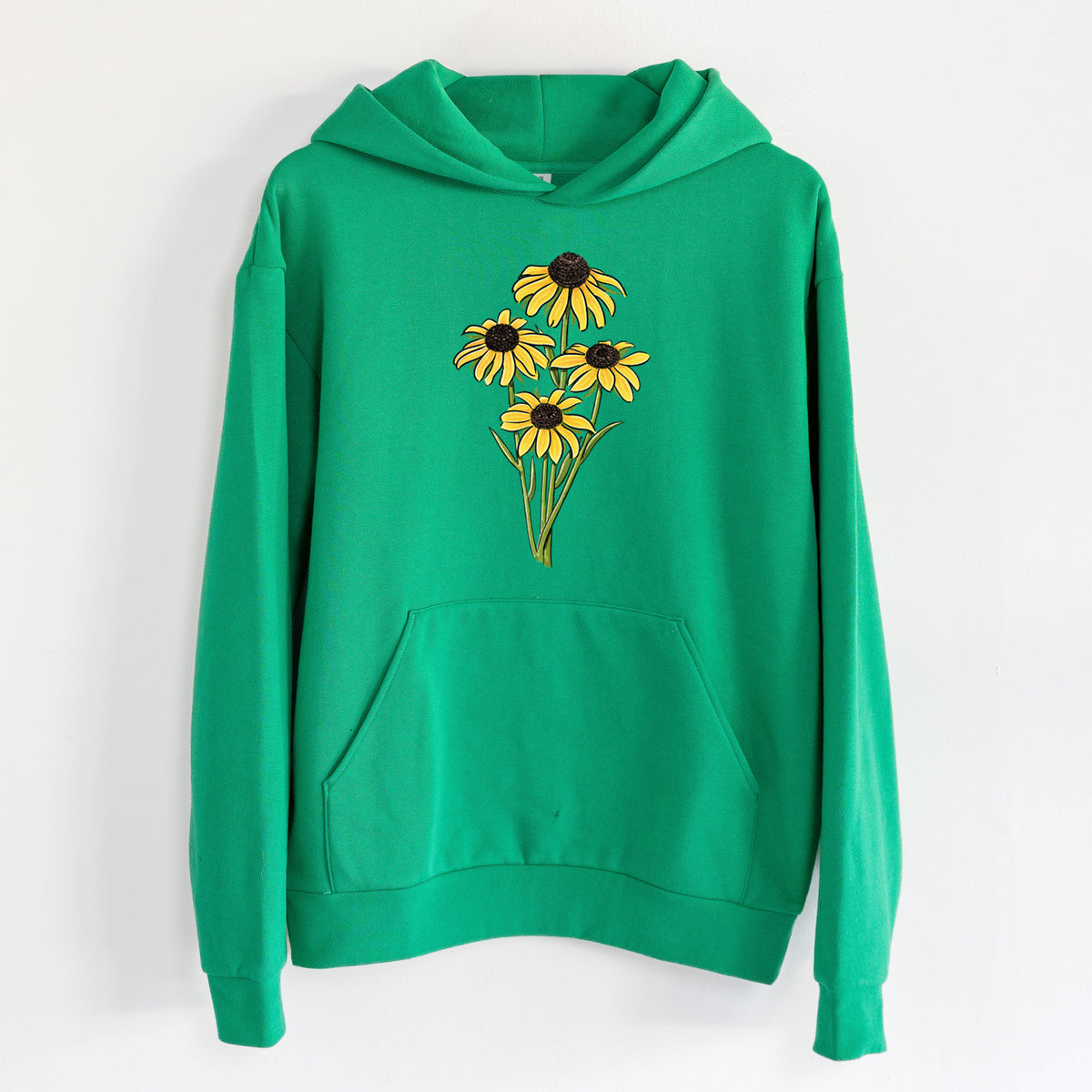 Black-eyed Susans - Rudbeckia hirta - Statement Midweight Hoodie in Kelly Green, hanging on a white wall, with a front kangaroo pocket and no drawcords.