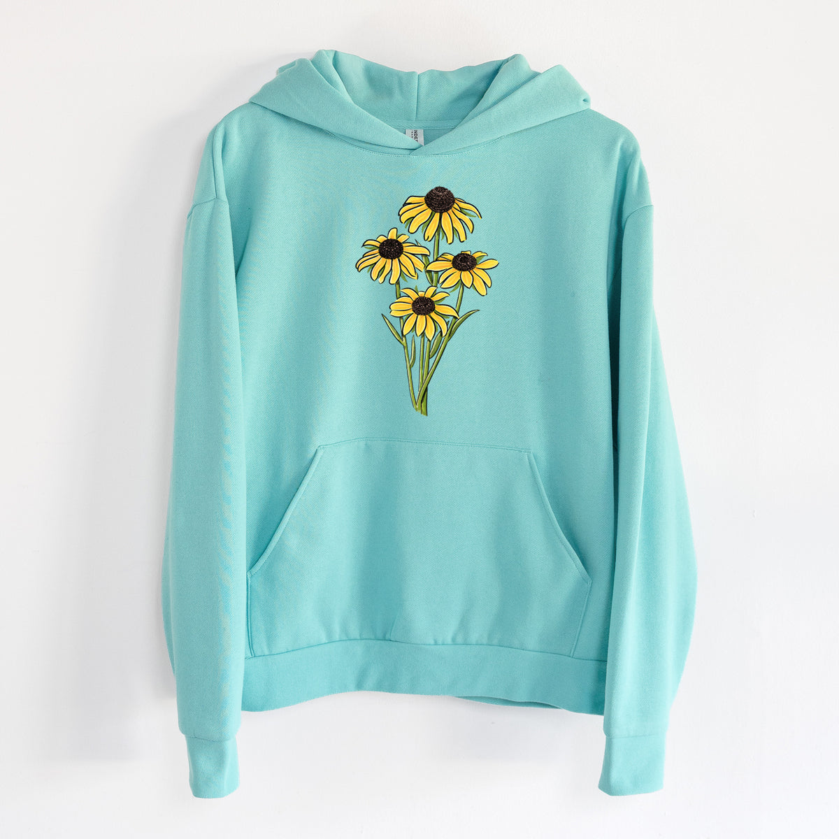 Black-eyed Susans - Rudbeckia hirta - Statement Midweight Hoodie in Seafoam, hanging on a white wall, with a front kangaroo pocket and no drawcords.