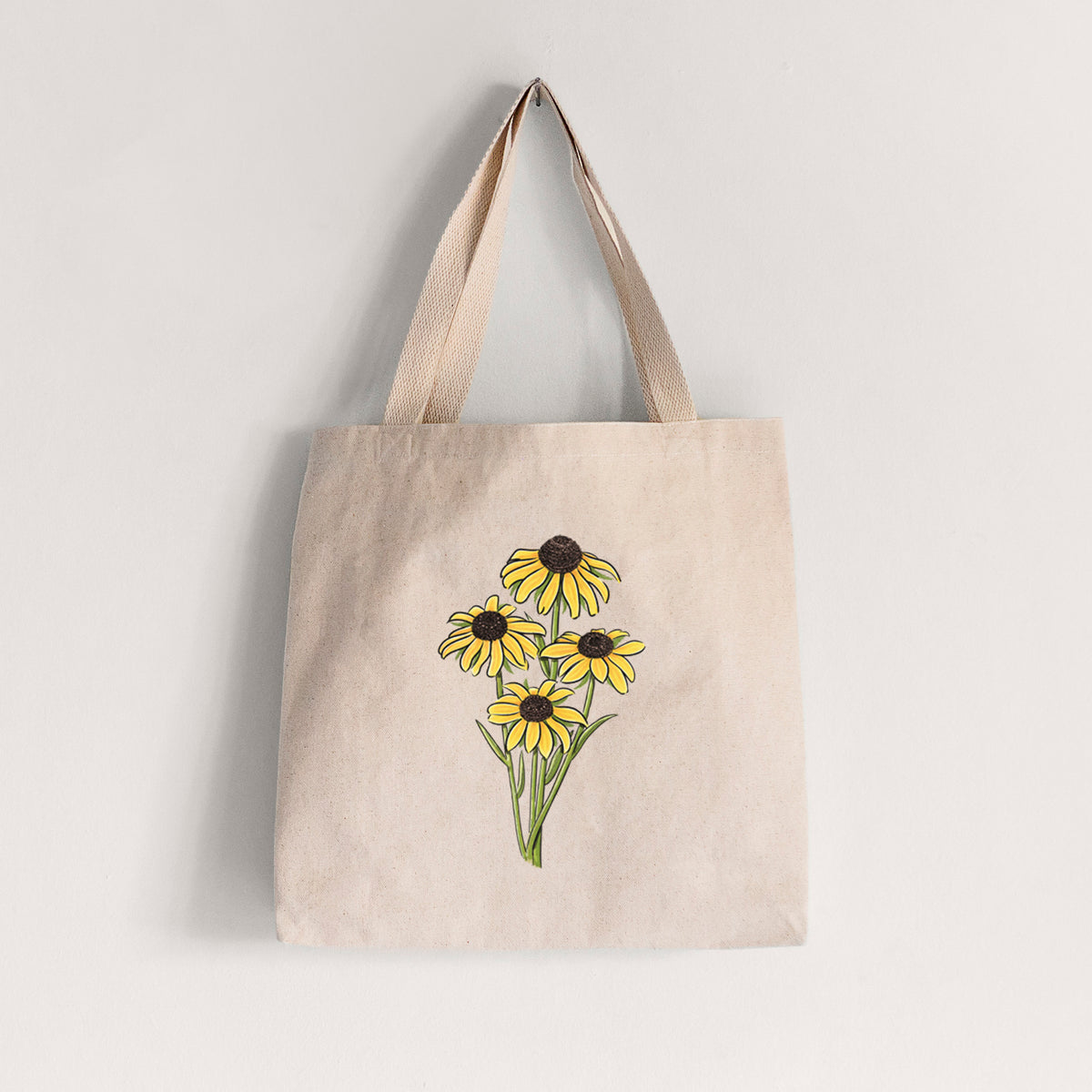 Natural canvas tote bag printed with a full-color bouquet of yellow black-eyed Susan flowers.