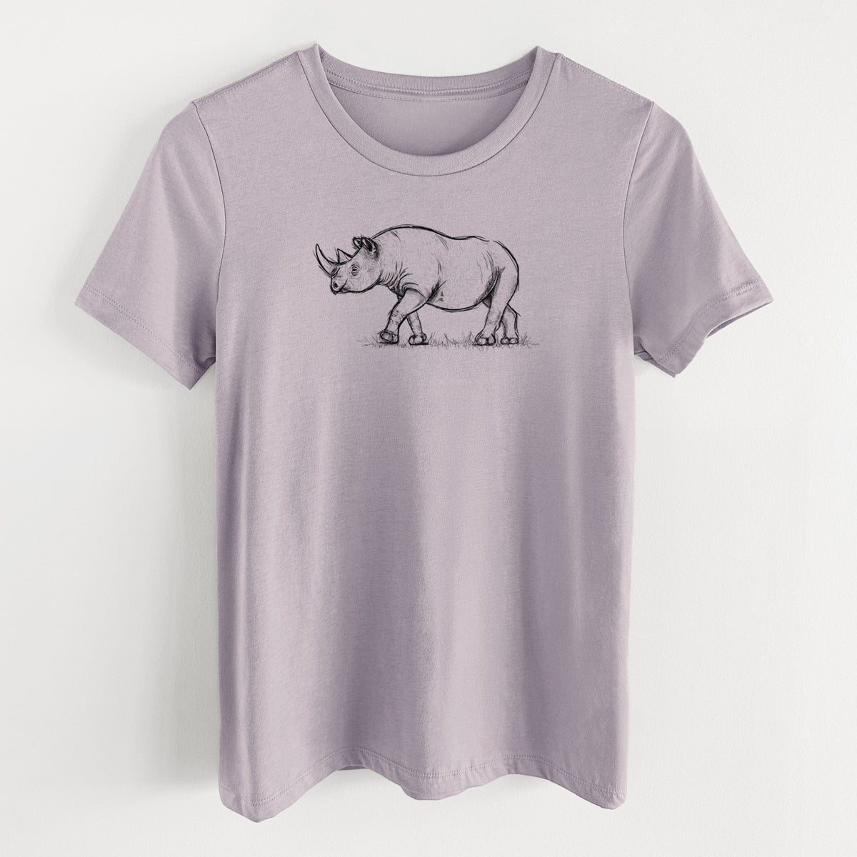 Light violet women's relaxed fit cotton t-shirt laid flat, printed with a black ink illustration of a black rhinoceros walking.