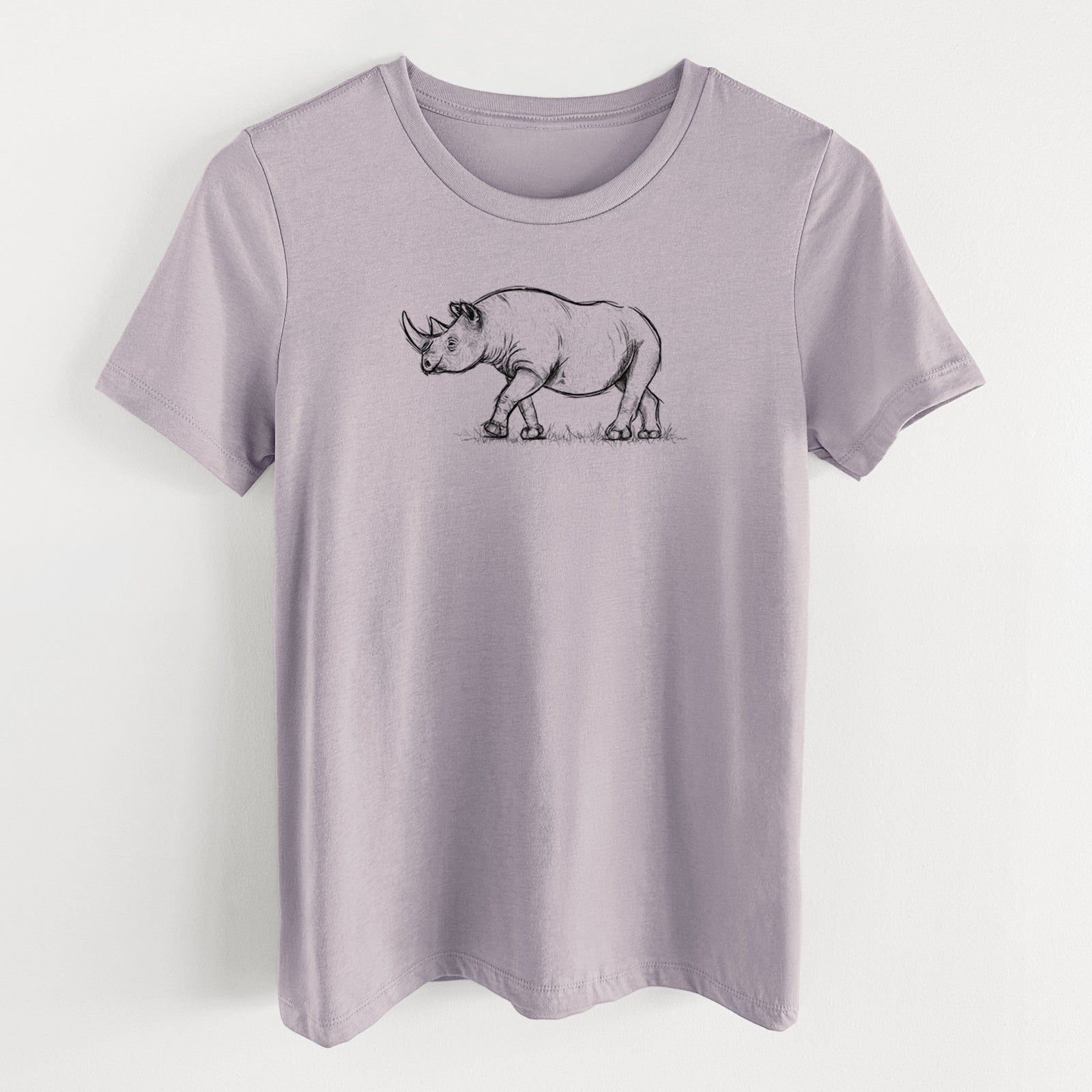 Light violet women's relaxed fit cotton t-shirt laid flat, printed with a black ink illustration of a black rhinoceros walking.