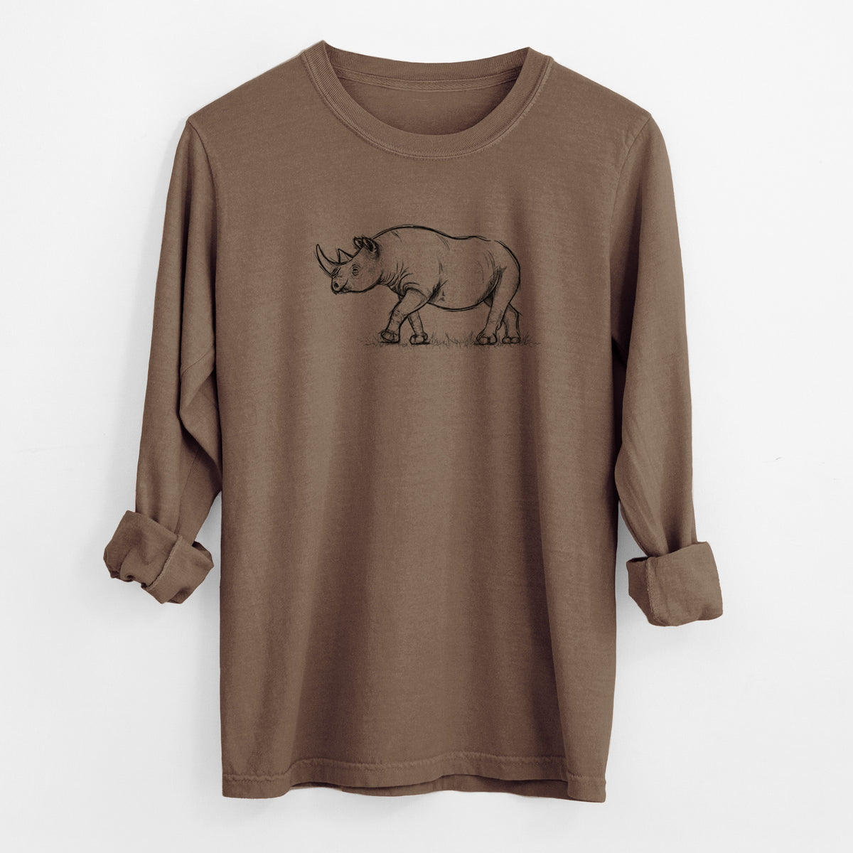 Espresso brown Comfort Colors long sleeve shirt laid flat with the cuffs rolled, printed with a black ink illustration of a black rhinoceros walking.