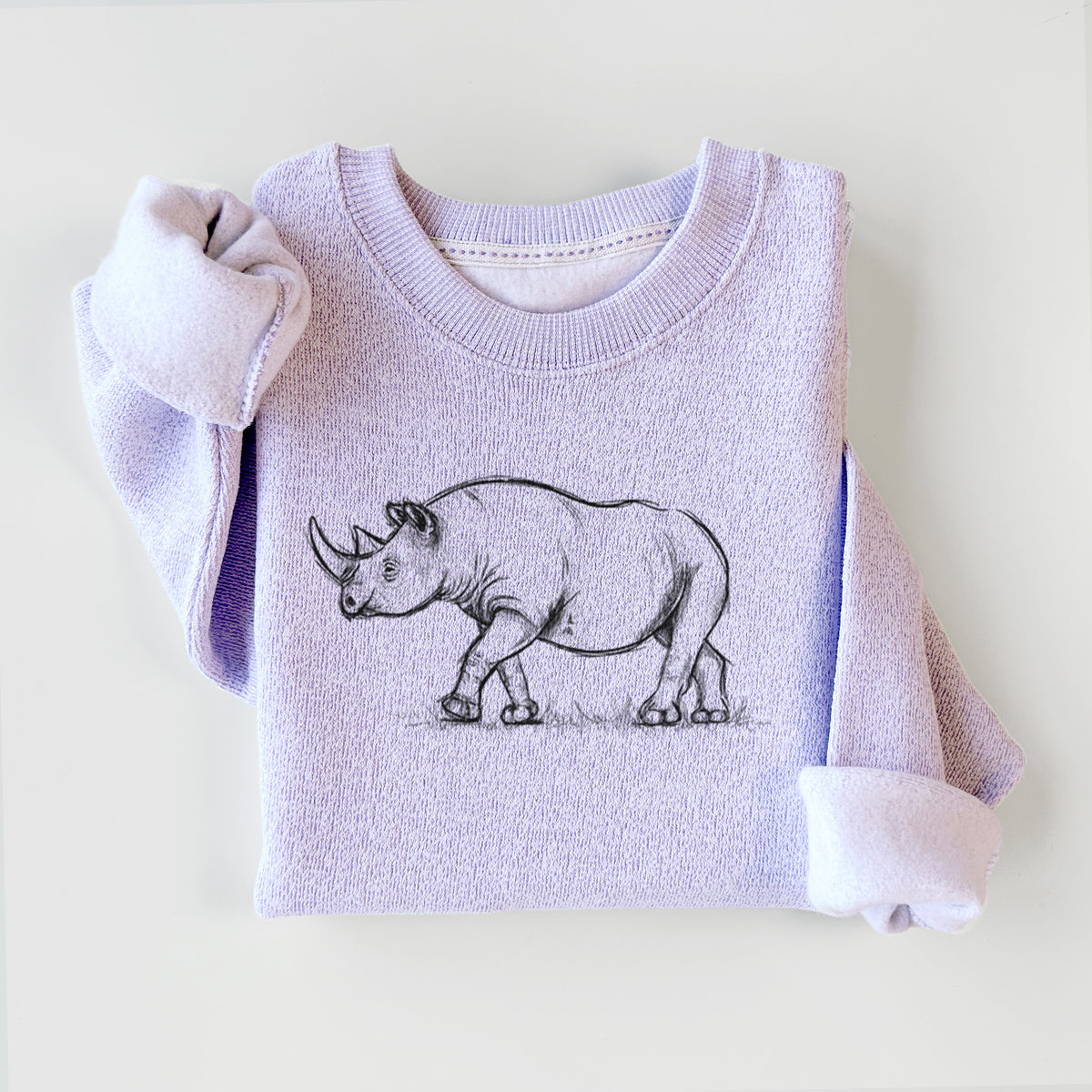 Ice purple knit sweatshirt printed with a black ink illustration of a black rhinoceros walking, styled flat.