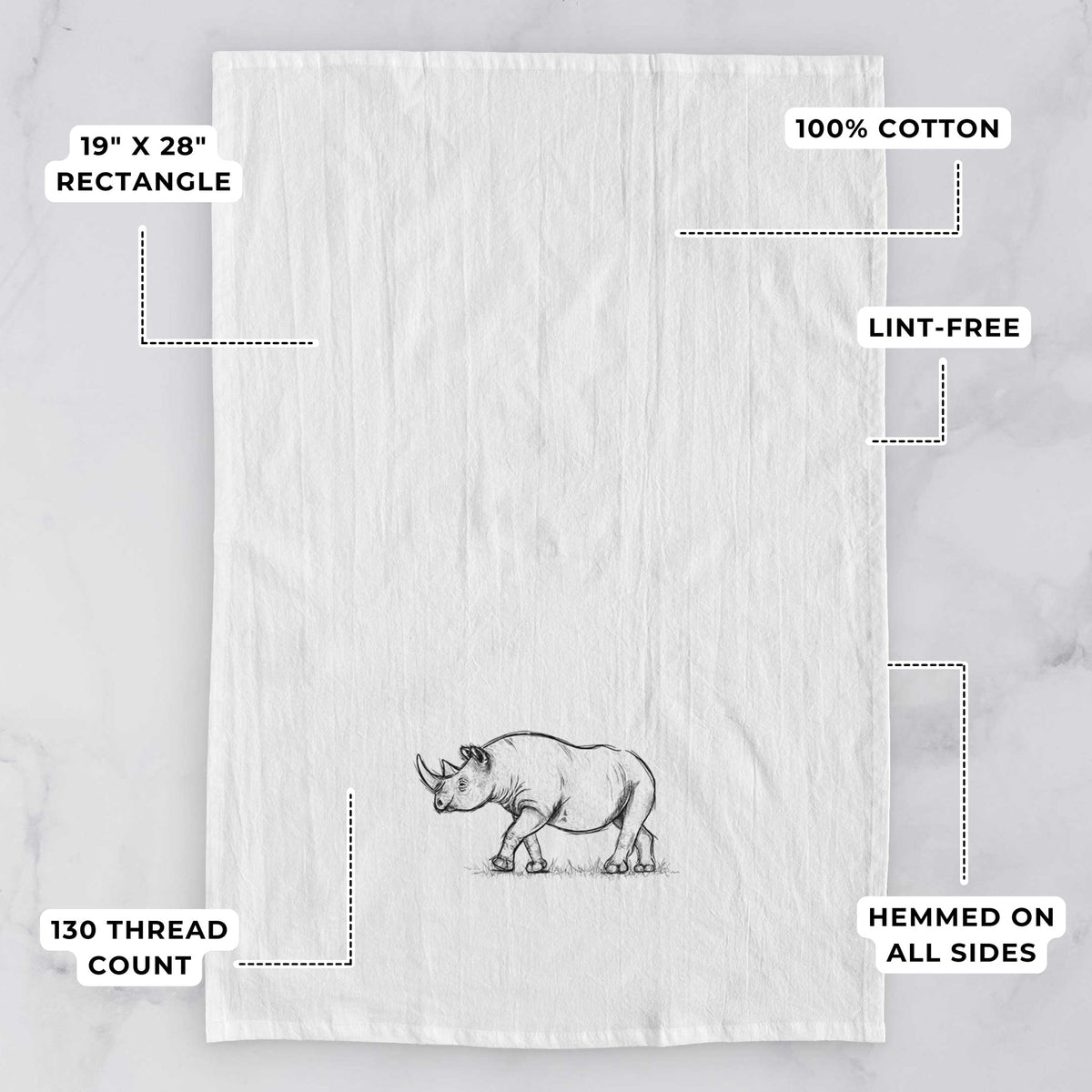 White tea towel printed with a black ink illustration of a black rhinoceros walking, with feature labels: 19 by 28 inch rectangle, 100% cotton, lint-free, 130 thread count, hemmed on all sides.