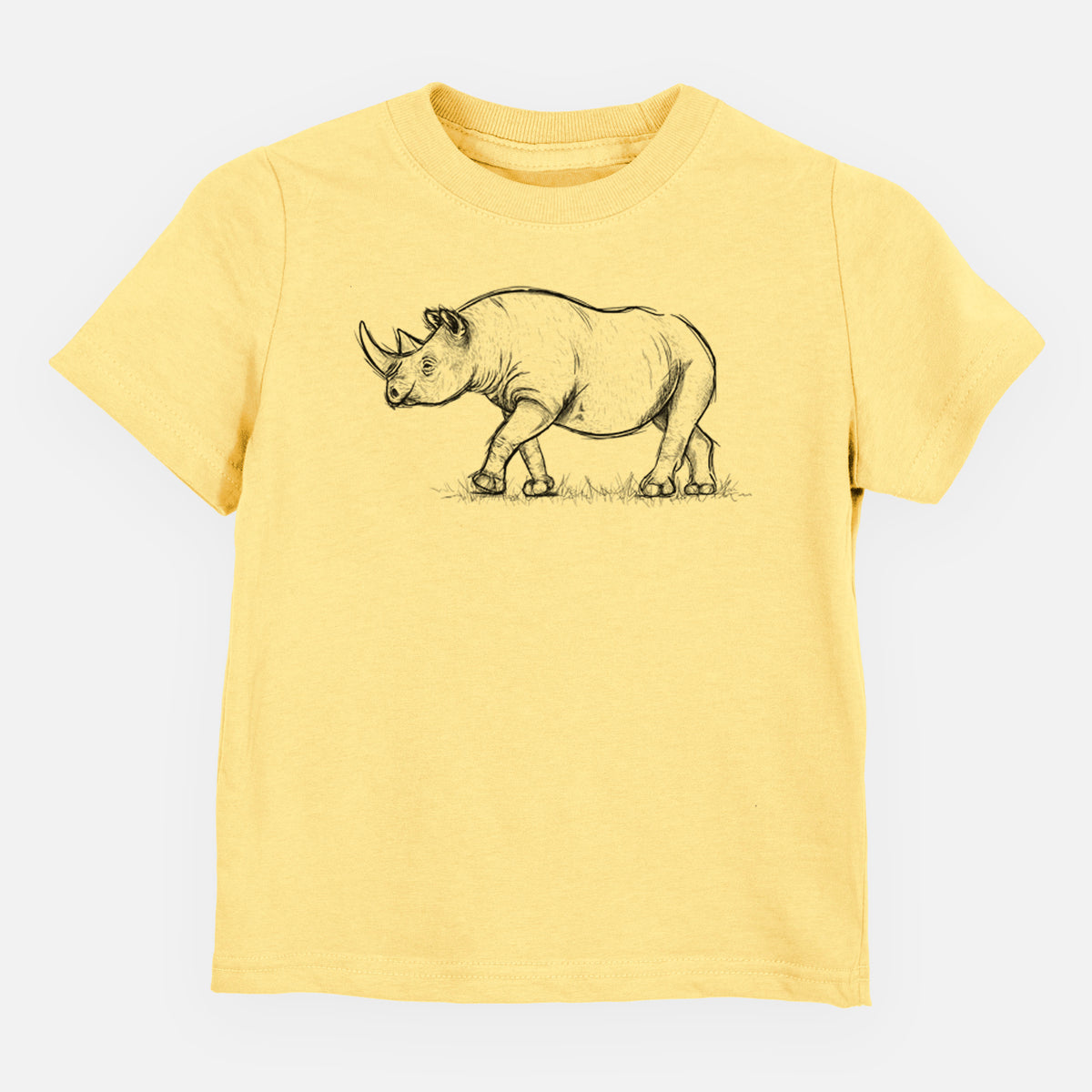Butter yellow toddler t-shirt laid flat, printed with a black ink illustration of a black rhinoceros walking.