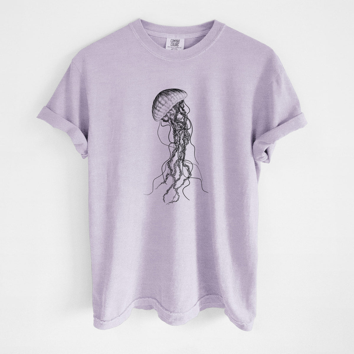 Orchid purple Comfort Colors t-shirt laid flat, printed with a black ink illustration of a black sea nettle jellyfish with long trailing tentacles.