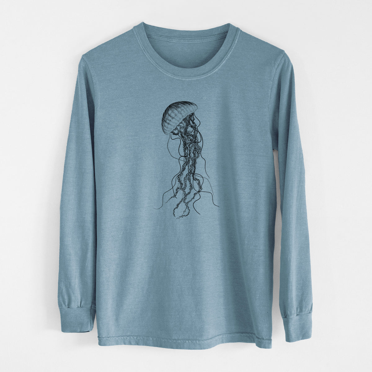 Steel blue Comfort Colors long sleeve shirt laid flat, printed with a black ink illustration of a black sea nettle jellyfish with long trailing tentacles.