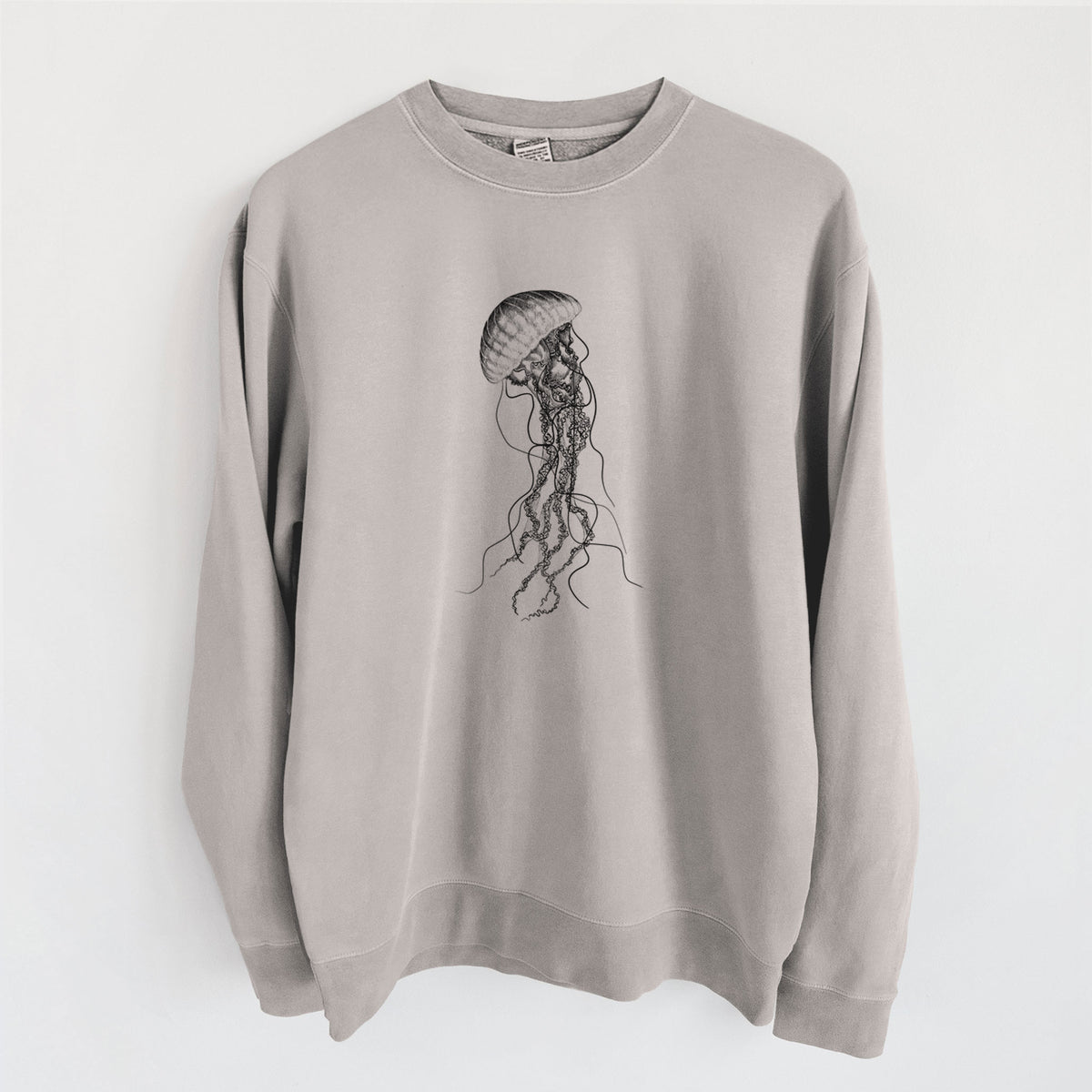Cement grey pigment dyed crewneck sweatshirt laid flat, printed with a black ink illustration of a black sea nettle jellyfish with long trailing tentacles.