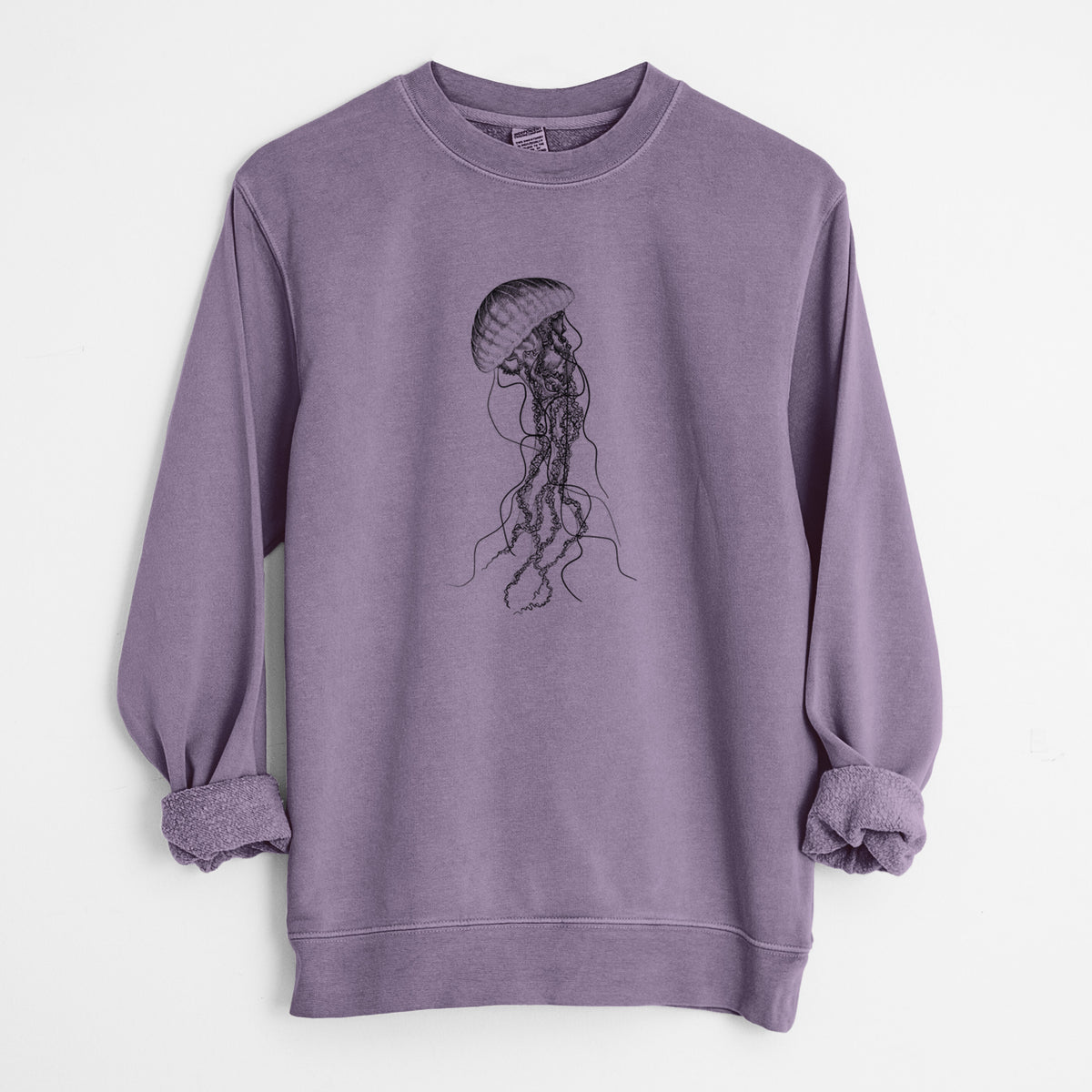Plum purple pigment dyed crewneck sweatshirt laid flat with the sleeves rolled, printed with a black ink illustration of a black sea nettle jellyfish with long trailing tentacles.