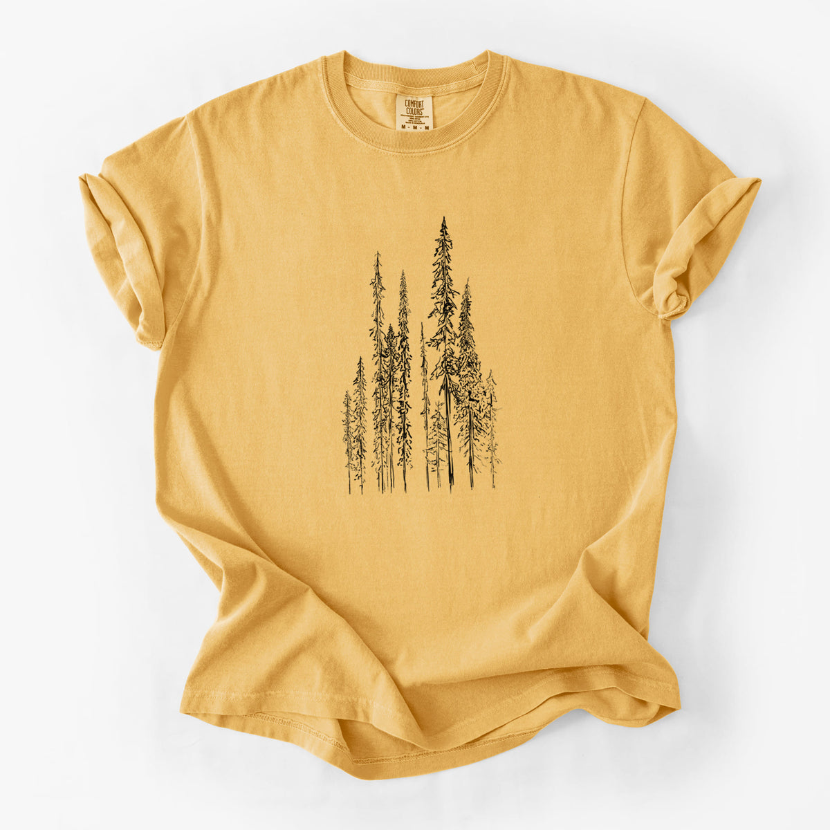 Golden wheat yellow Comfort Colors t-shirt laid flat, printed with a black ink illustration of a stand of tall, narrow black spruce trees.