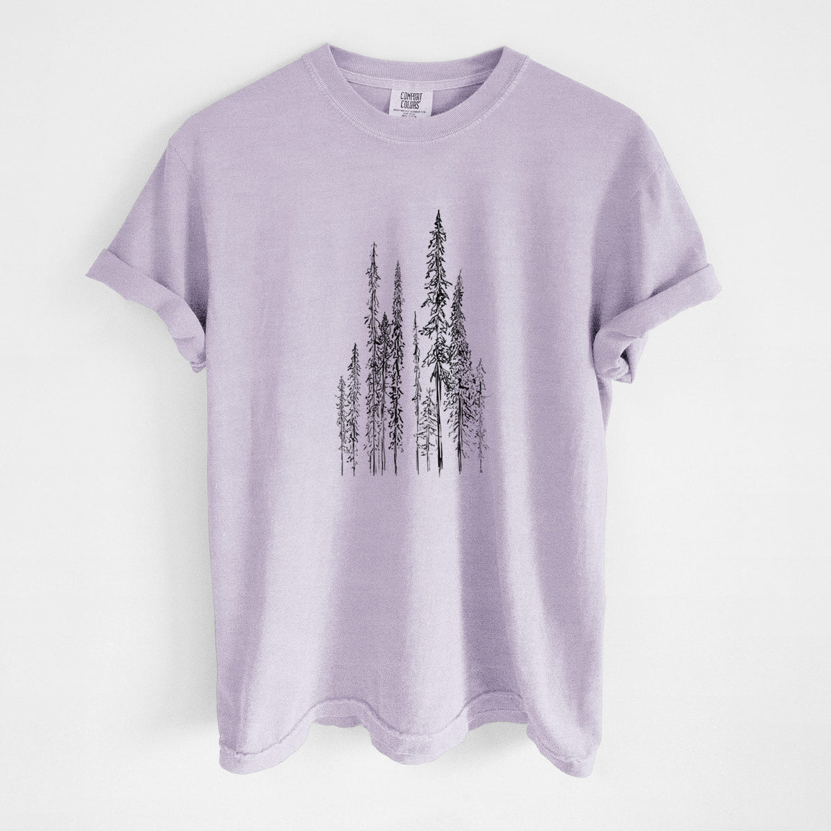 Orchid purple Comfort Colors t-shirt laid flat, printed with a black ink illustration of a stand of tall, narrow black spruce trees.