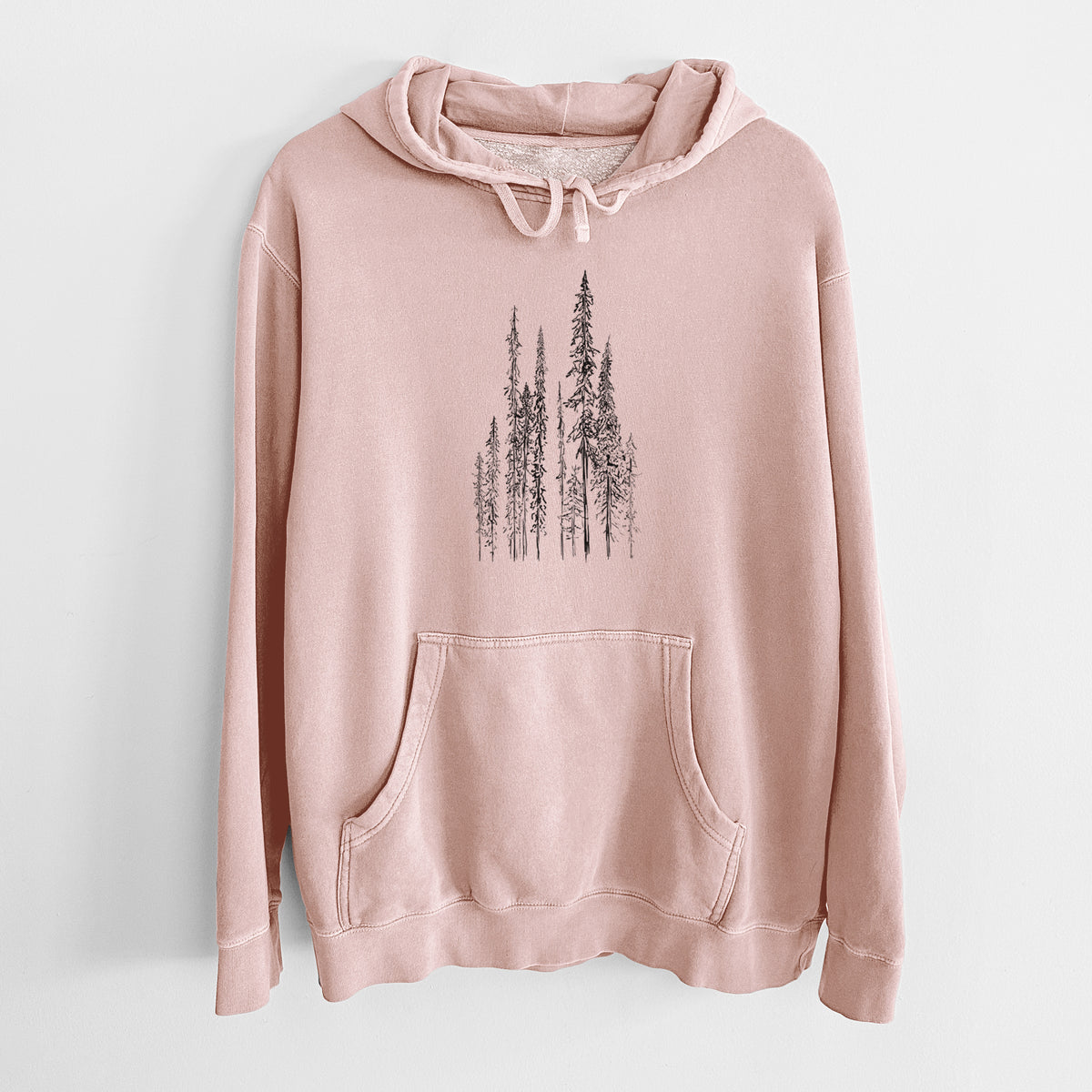 Dusty pink pigment dyed hoodie laid flat, printed with a black ink illustration of a stand of tall, narrow black spruce trees.