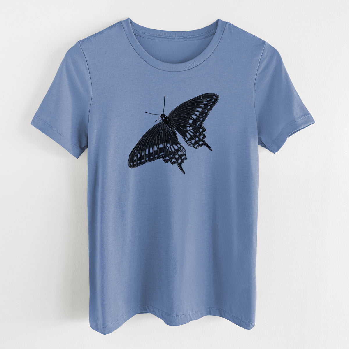 Blue bell women's relaxed fit cotton t-shirt laid flat, printed with a detailed black ink illustration of a black swallowtail butterfly with its wings spread.