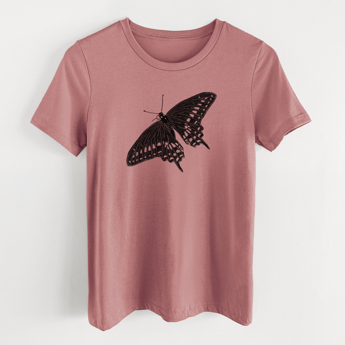 Mauve pink women's relaxed fit cotton t-shirt laid flat, printed with a detailed black ink illustration of a black swallowtail butterfly with its wings spread.