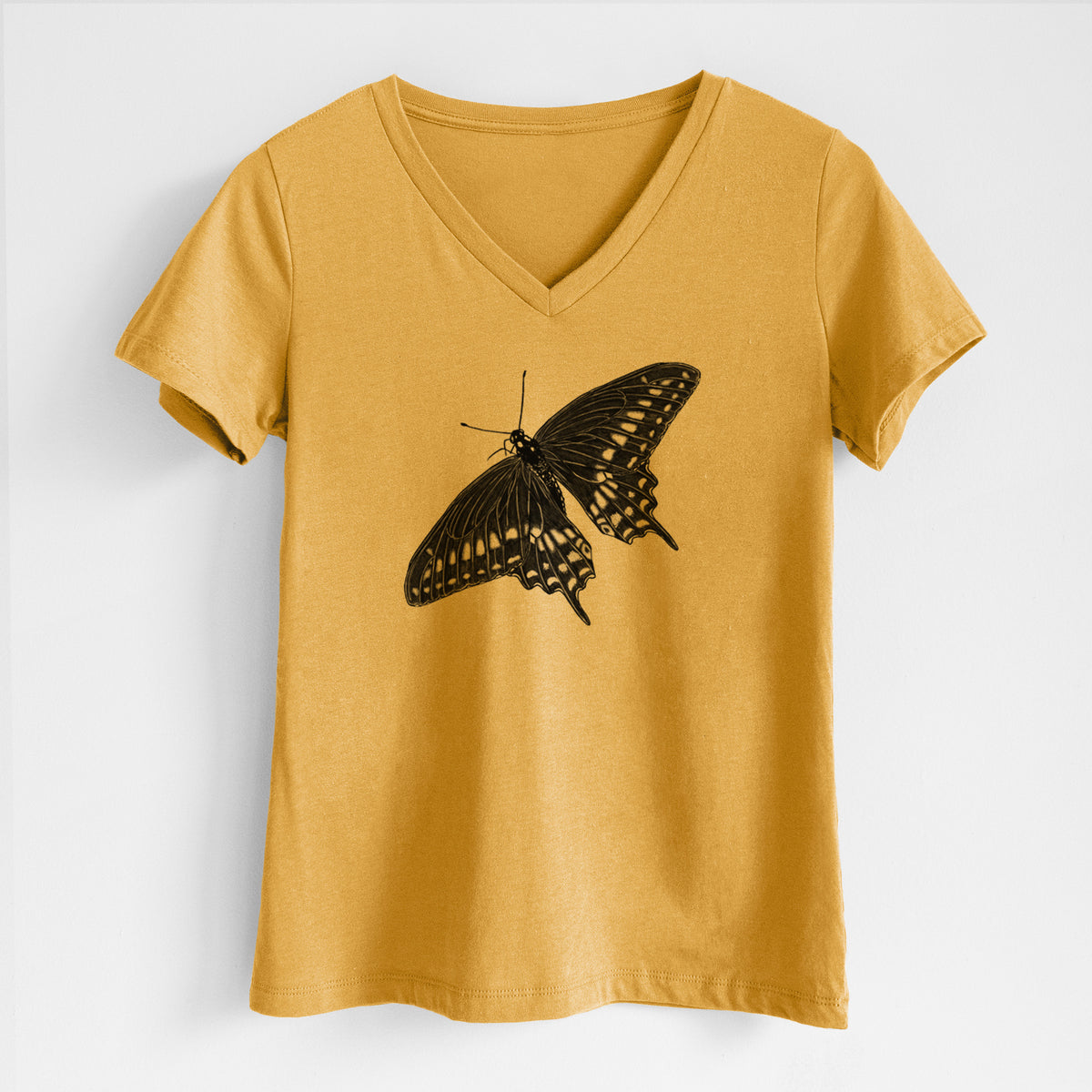 Honeycomb yellow women's relaxed fit cotton V-neck t-shirt laid flat, printed with a detailed black ink illustration of a black swallowtail butterfly with its wings spread.