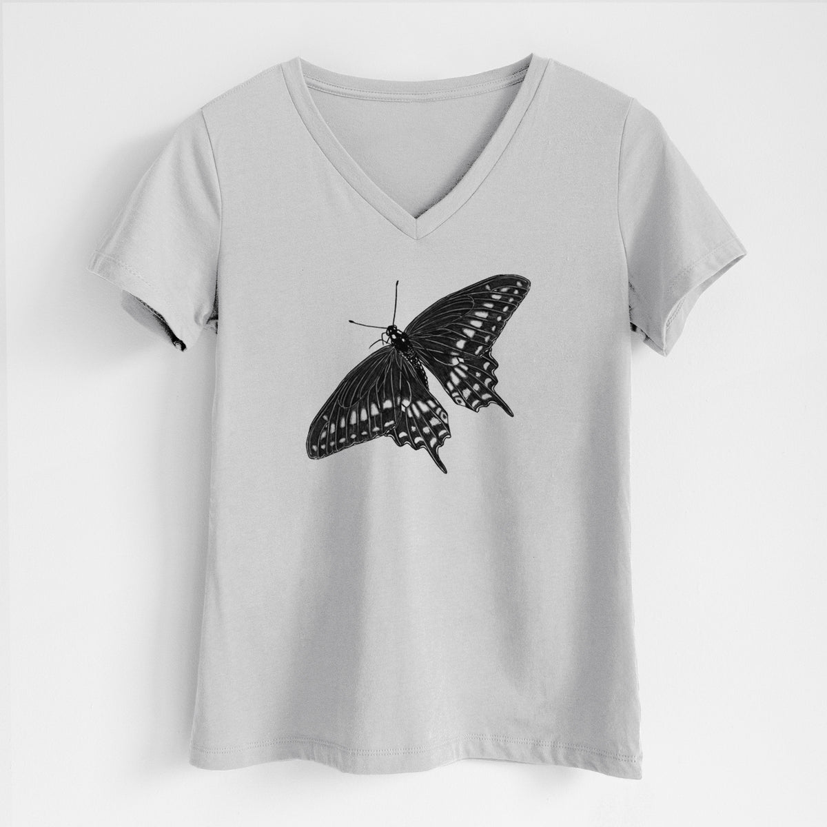 Lunar grey women's relaxed fit cotton V-neck t-shirt laid flat, printed with a detailed black ink illustration of a black swallowtail butterfly with its wings spread.