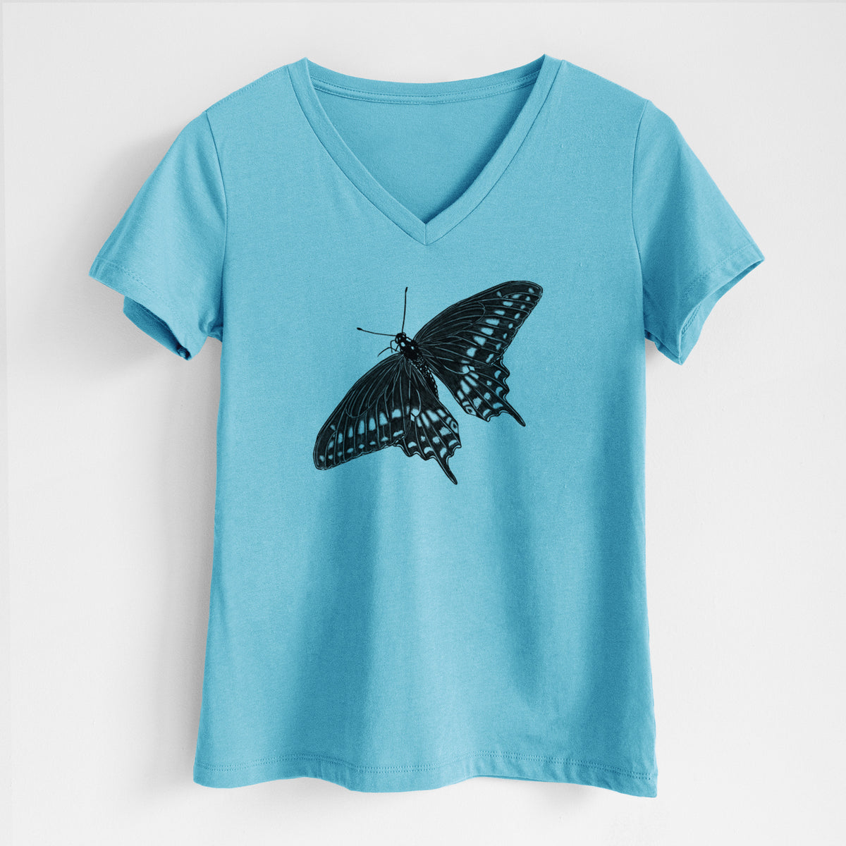 Turquoise women's relaxed fit cotton V-neck t-shirt laid flat, printed with a detailed black ink illustration of a black swallowtail butterfly with its wings spread.