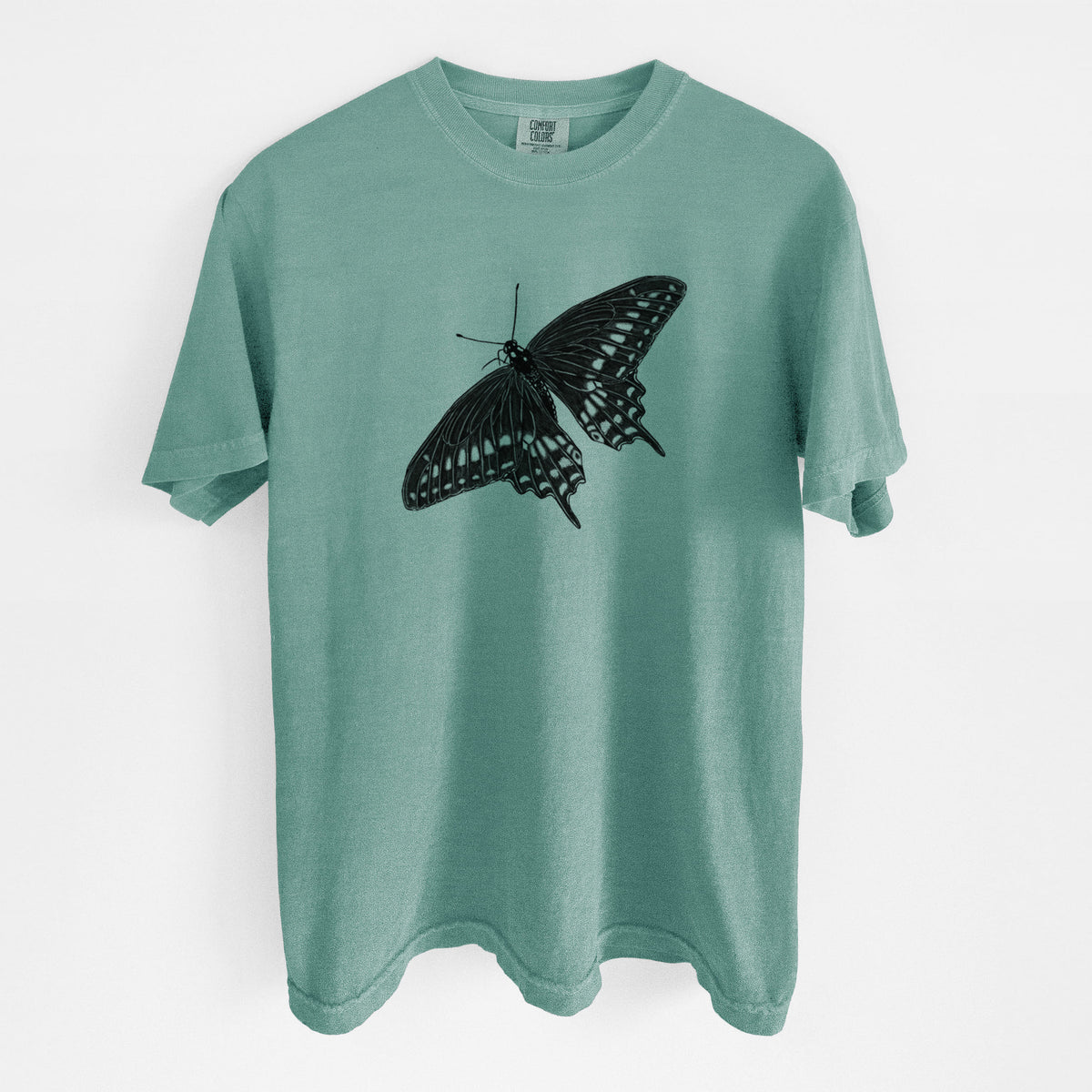 Reef green Comfort Colors t-shirt laid flat, printed with a detailed black ink illustration of a black swallowtail butterfly with its wings spread.