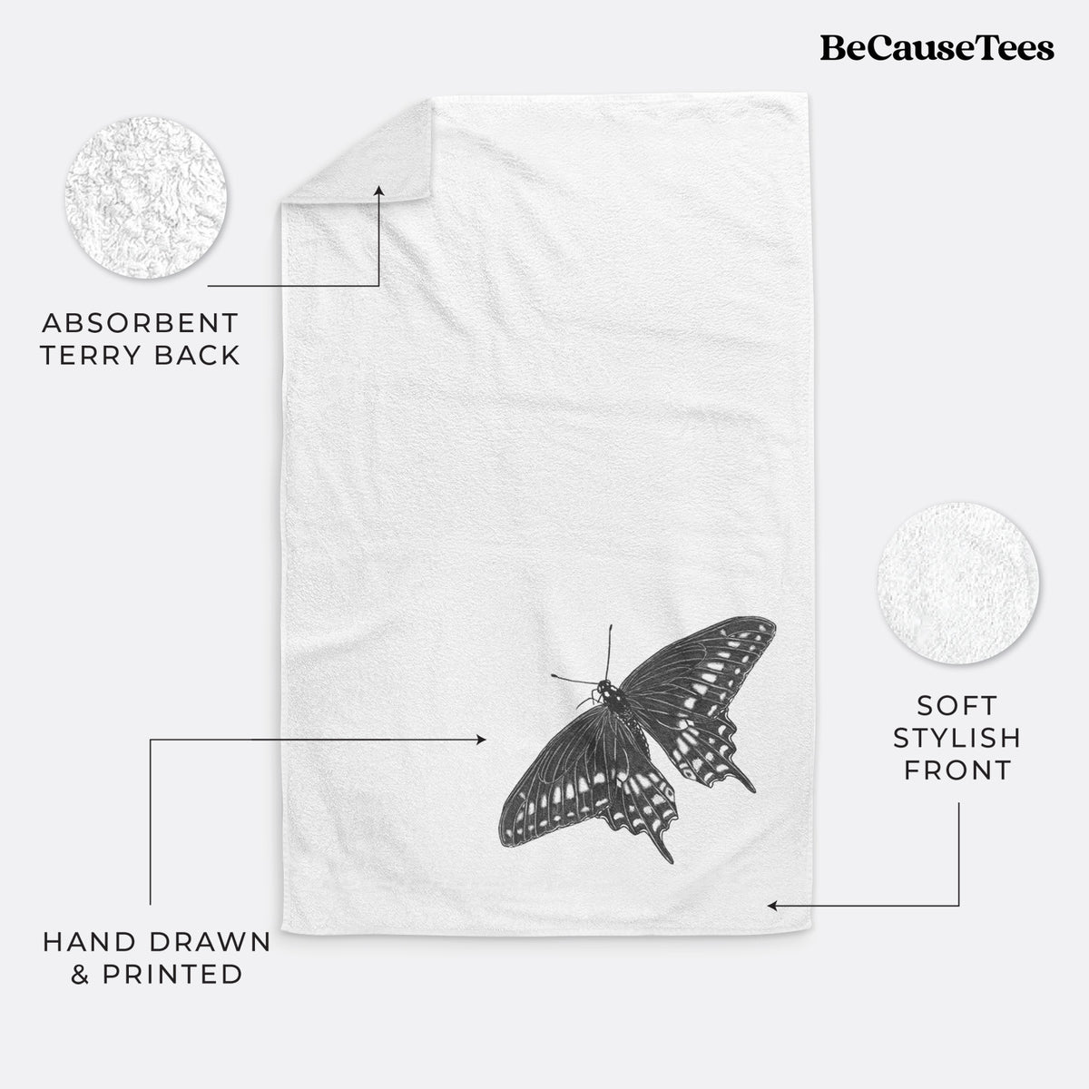 White hand towel printed with a detailed black ink illustration of a black swallowtail butterfly with its wings spread.