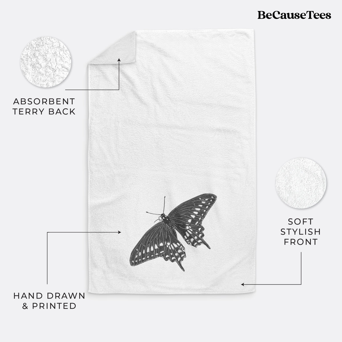 White hand towel printed with a detailed black ink illustration of a black swallowtail butterfly with its wings spread.