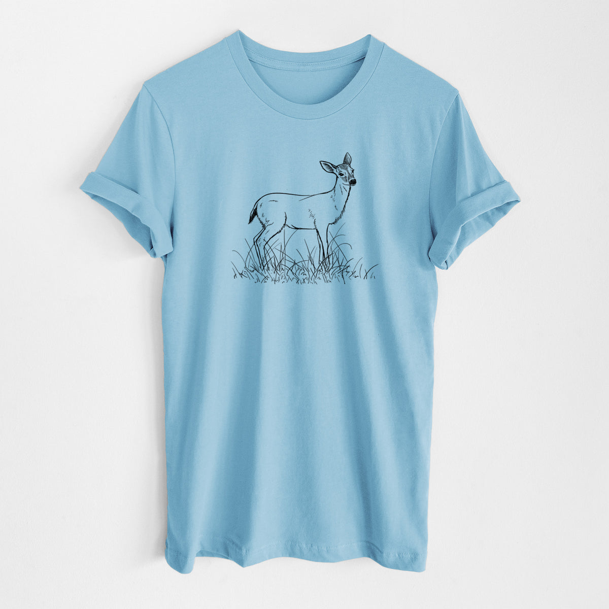 Ocean blue lightweight cotton t-shirt laid flat, printed with a black ink sketch of a black-tailed deer standing in tall grass.