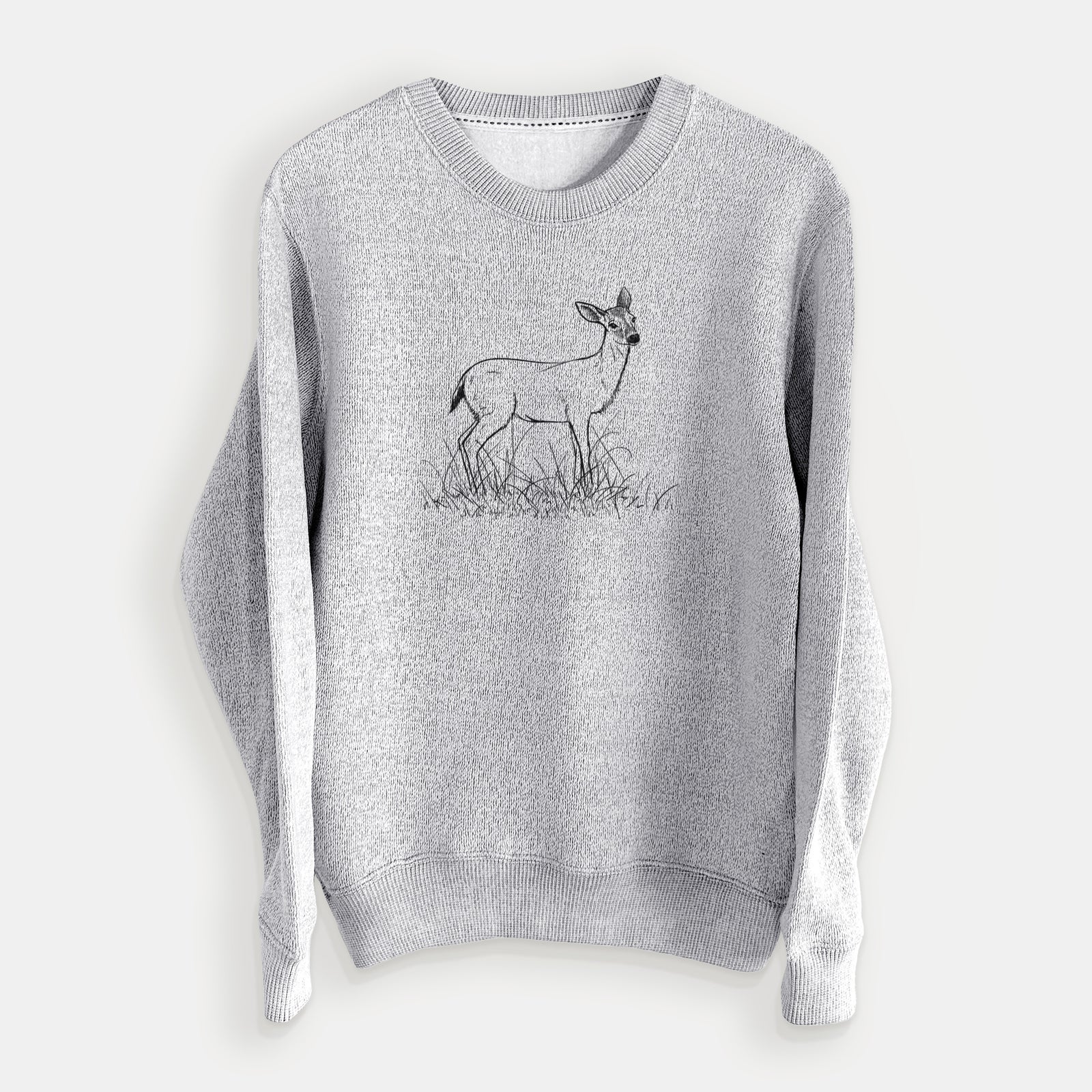 Salt and pepper knit sweatshirt laid flat, printed with a black ink sketch of a black-tailed deer standing in tall grass.