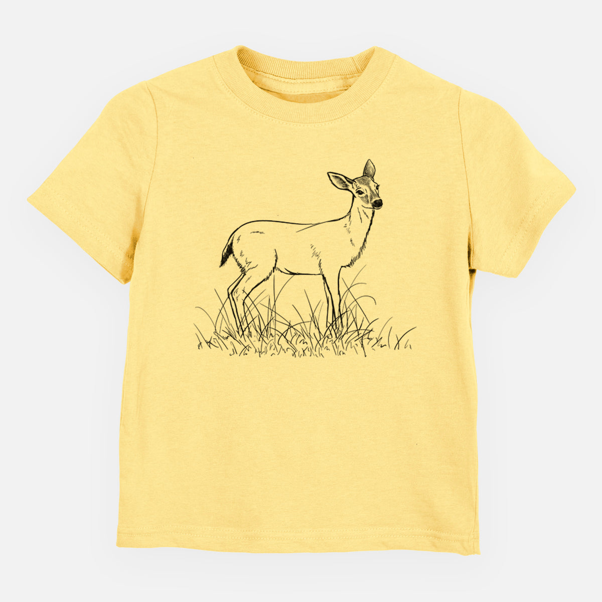 Butter yellow toddler t-shirt laid flat, printed with a black ink sketch of a black-tailed deer standing in tall grass.