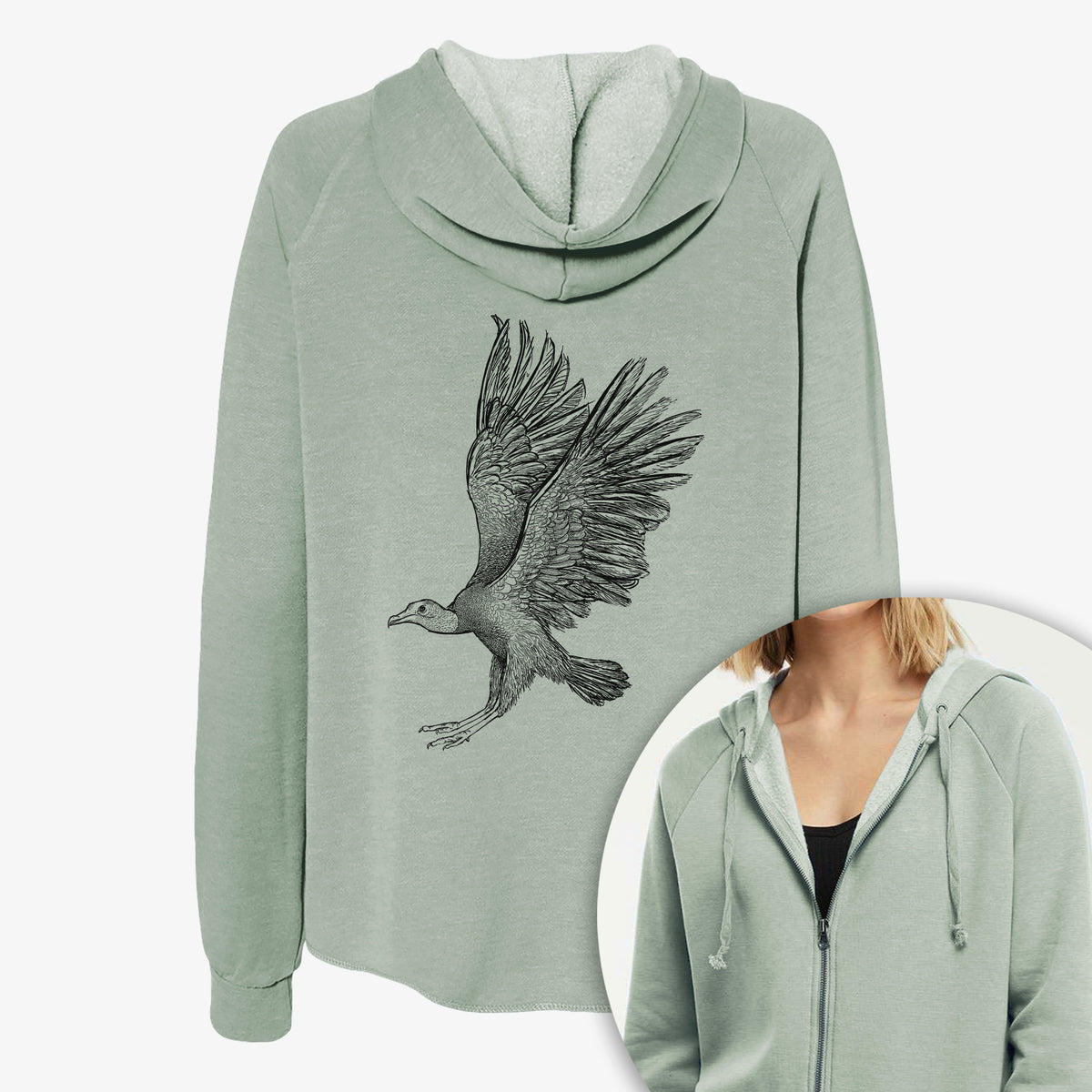 Women's Cali Wave zip-up sweatshirt printed with a detailed black ink illustration of a black vulture landing with its wings spread, with a close-up of the zipper.
