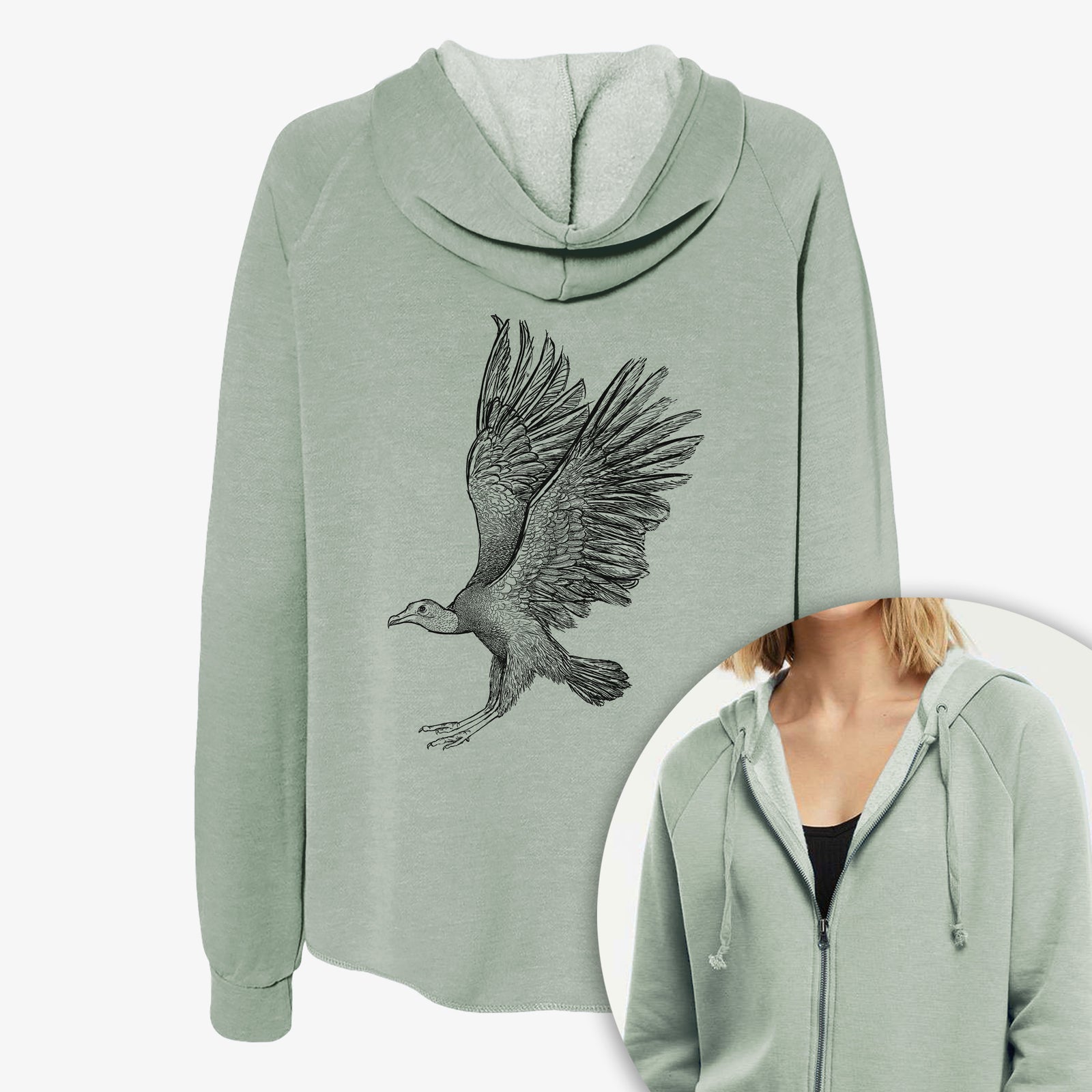 Women's Cali Wave zip-up sweatshirt printed with a detailed black ink illustration of a black vulture landing with its wings spread, with a close-up of the zipper.