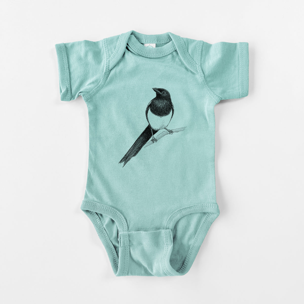 Saltwater baby bodysuit laid flat, printed with a detailed black ink sketch of a black-billed magpie perched on a branch with its long tail.